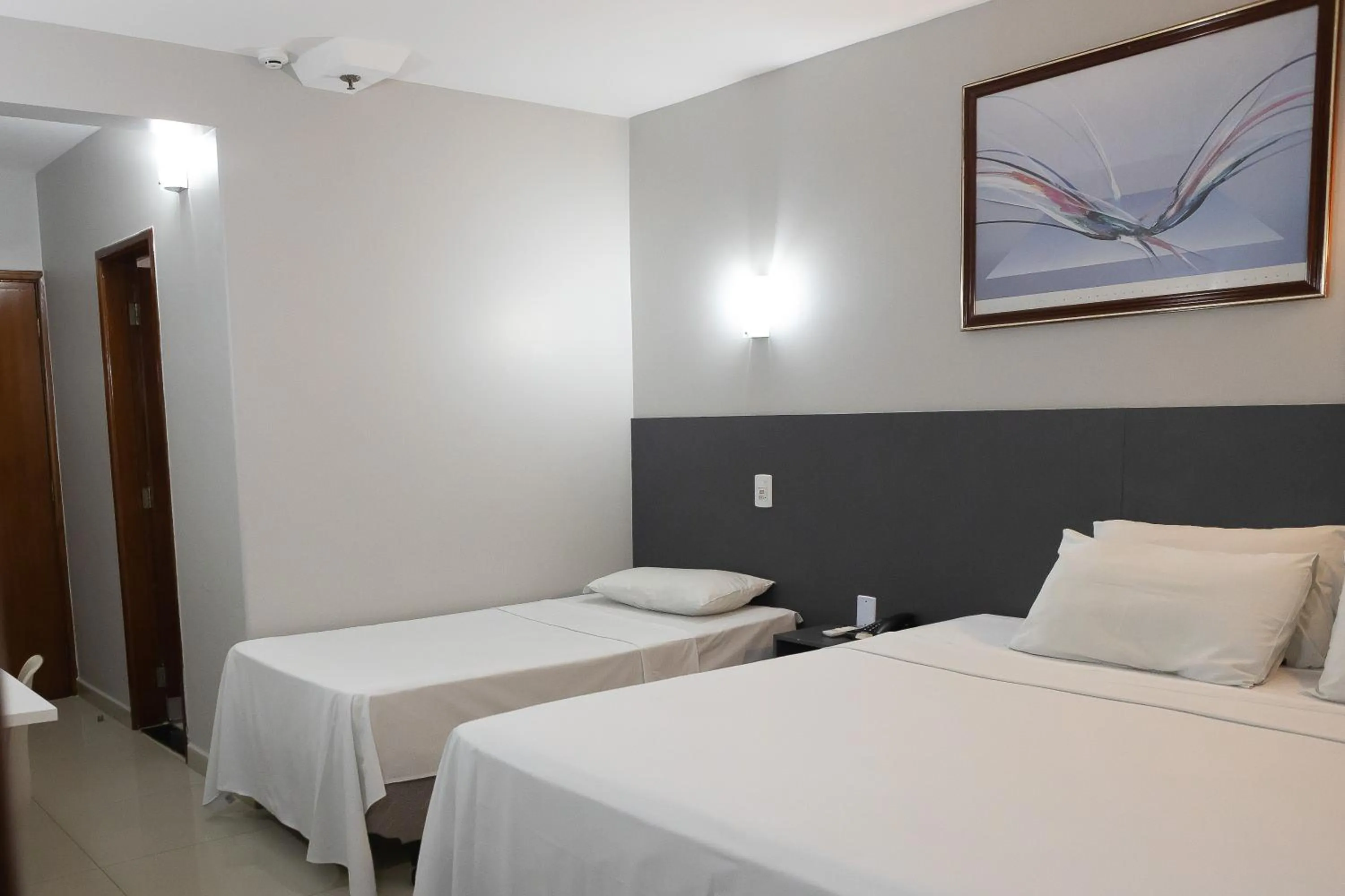 Bed in Allegro Hotel