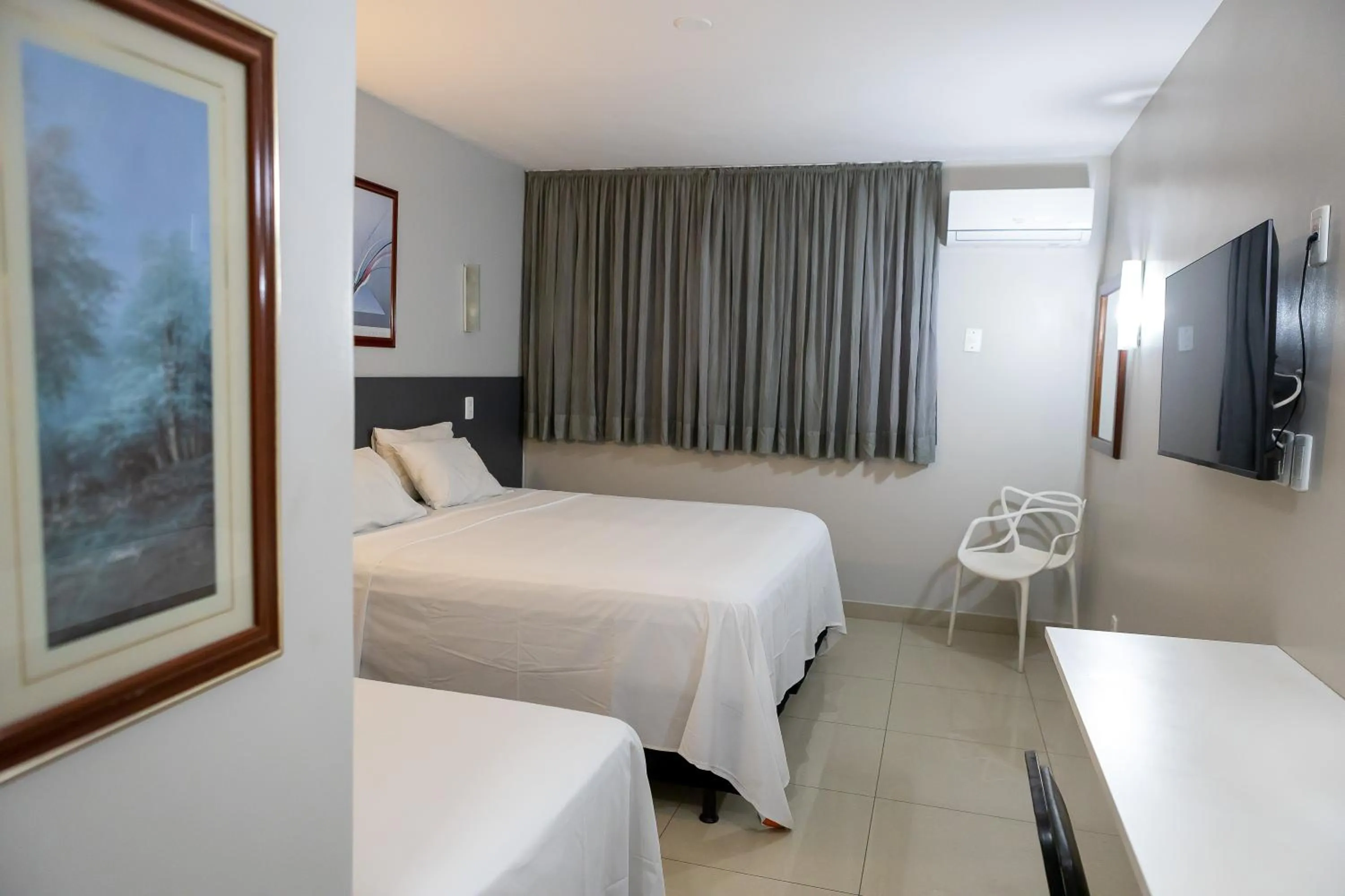 Bed in Allegro Hotel