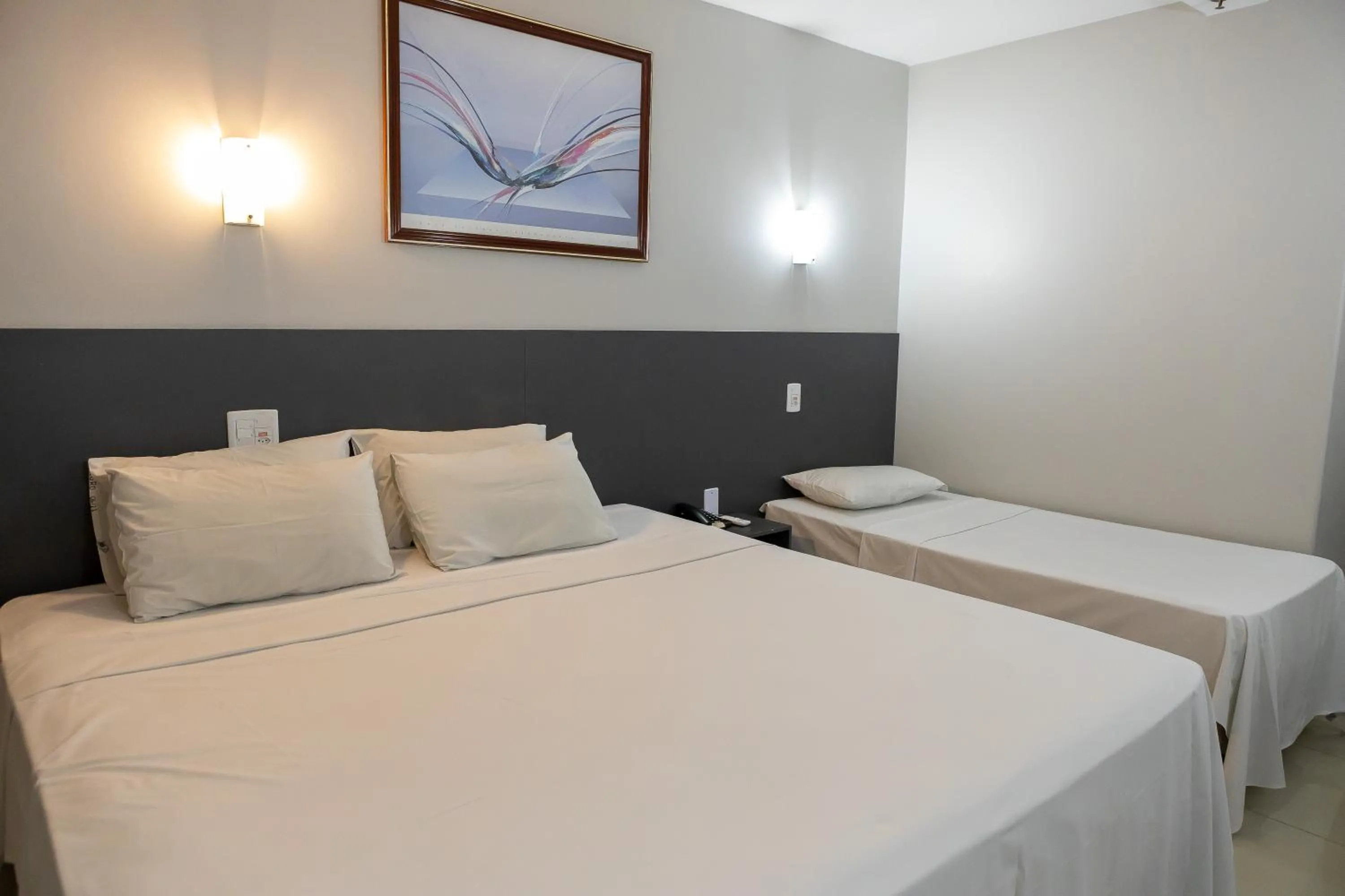 Bed in Allegro Hotel