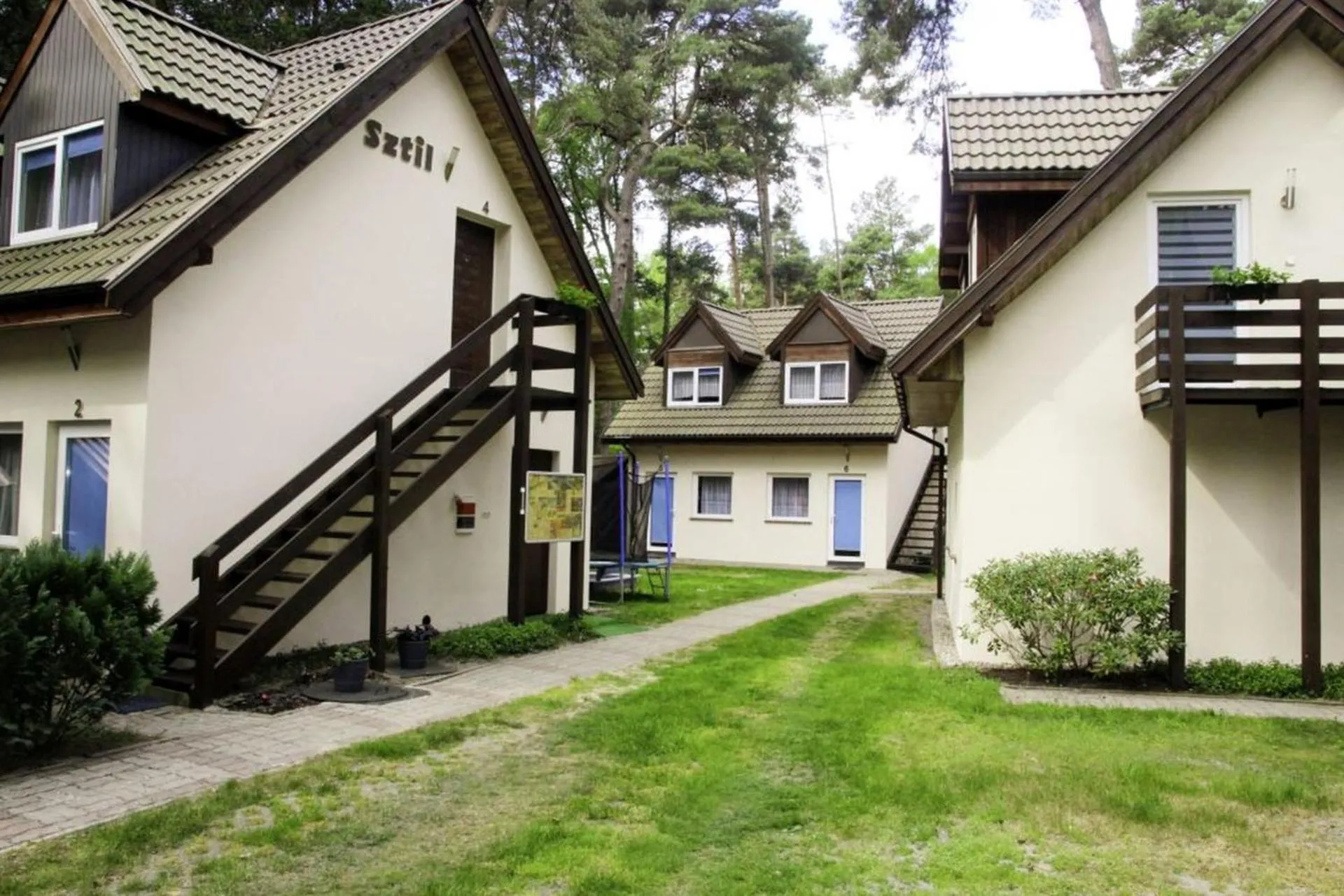 Property building in Sztil - Apartamenty i drewniane domki