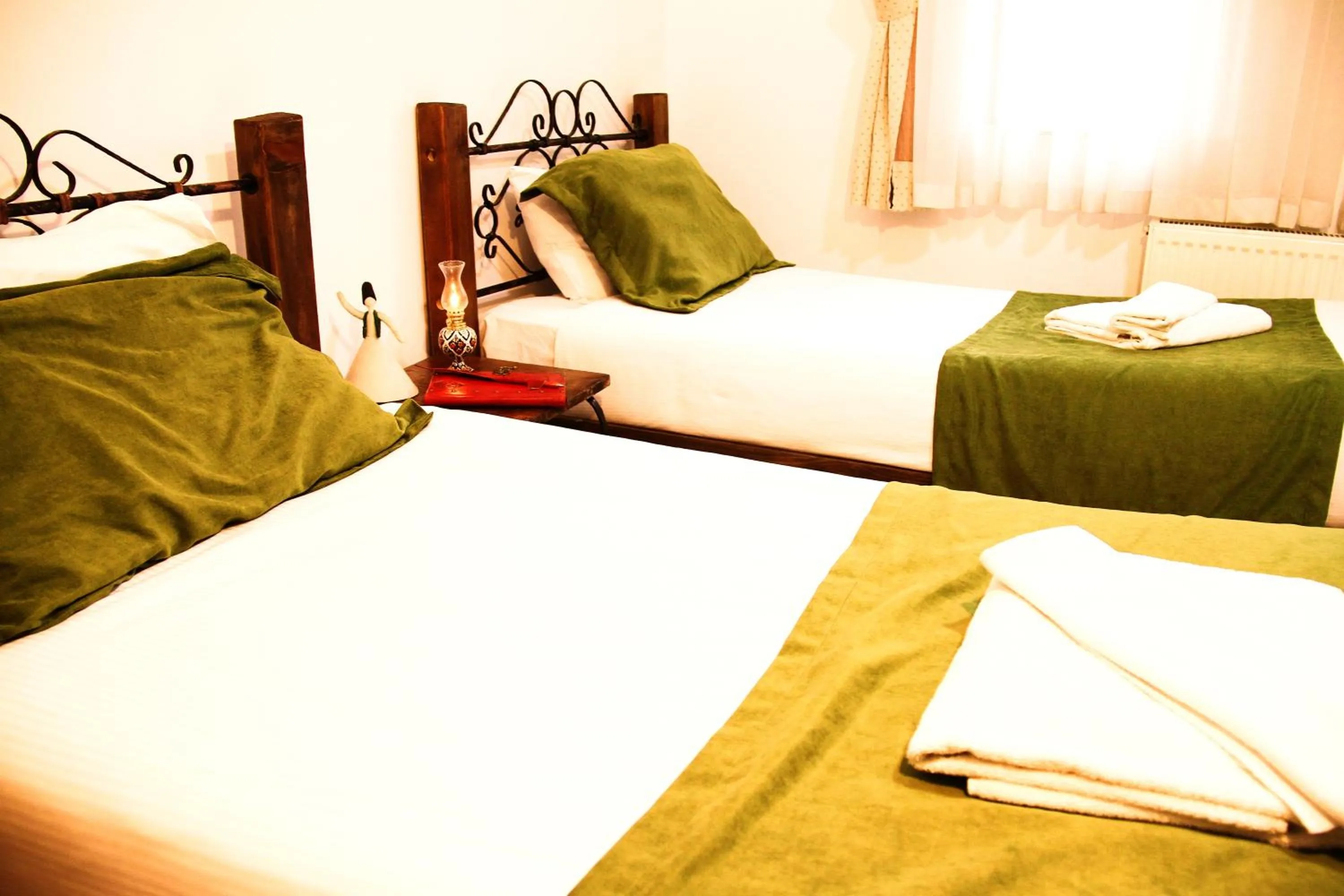 Bed in Kufe Hotel