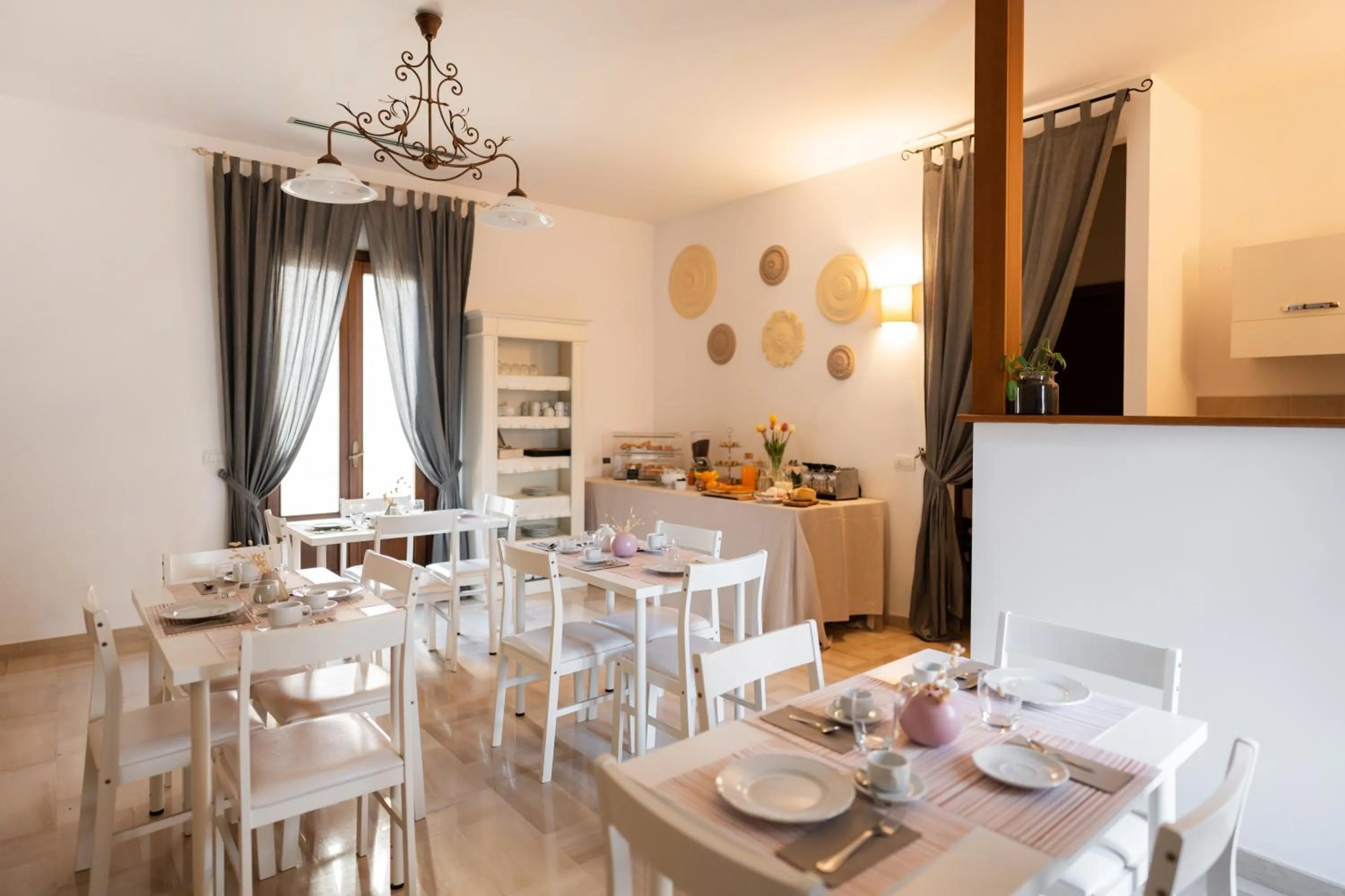 Dining area in Palazzo De Luca by Apulia Hospitality