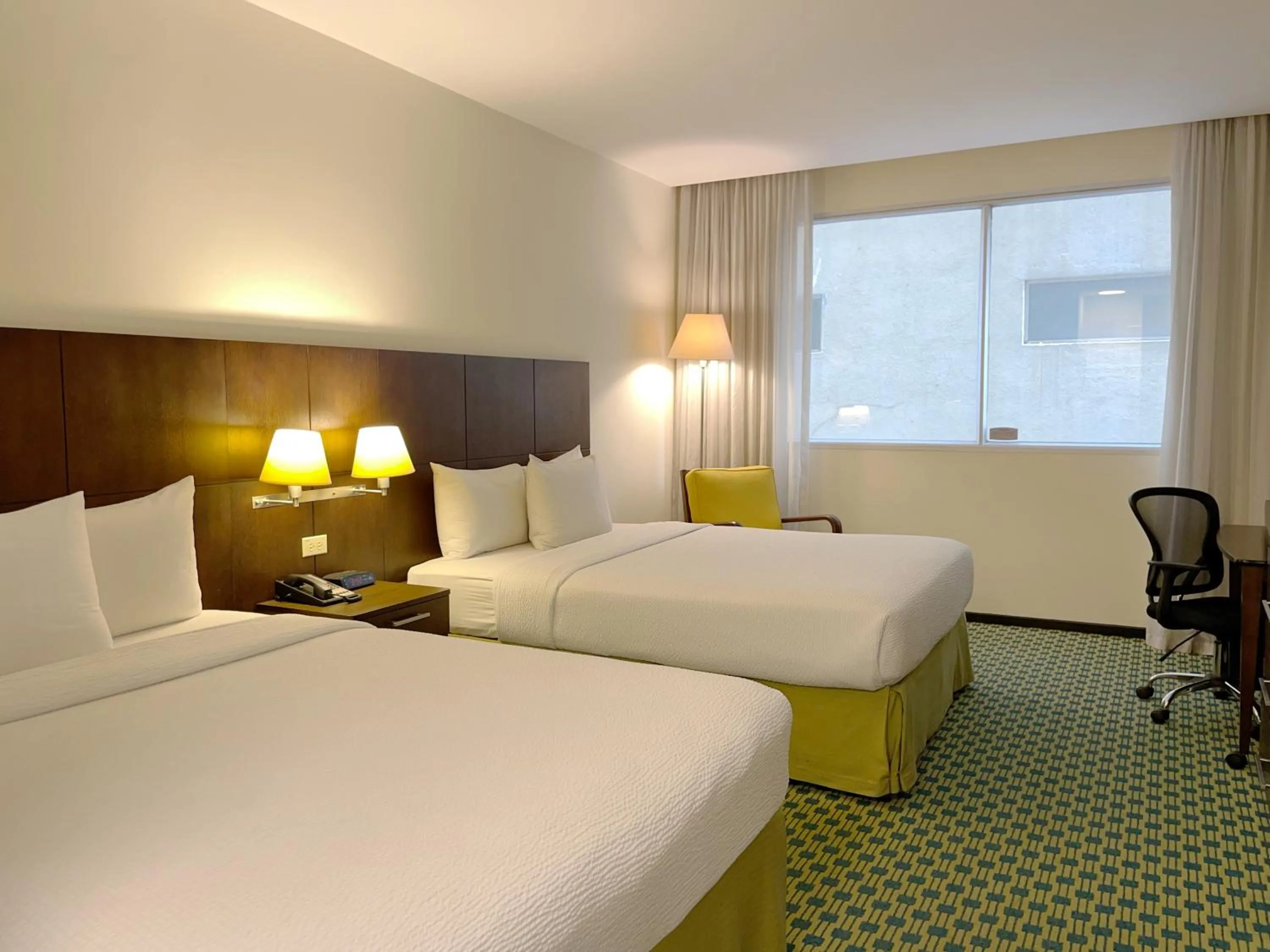 Bed in Courtyard by Marriott Guayaquil