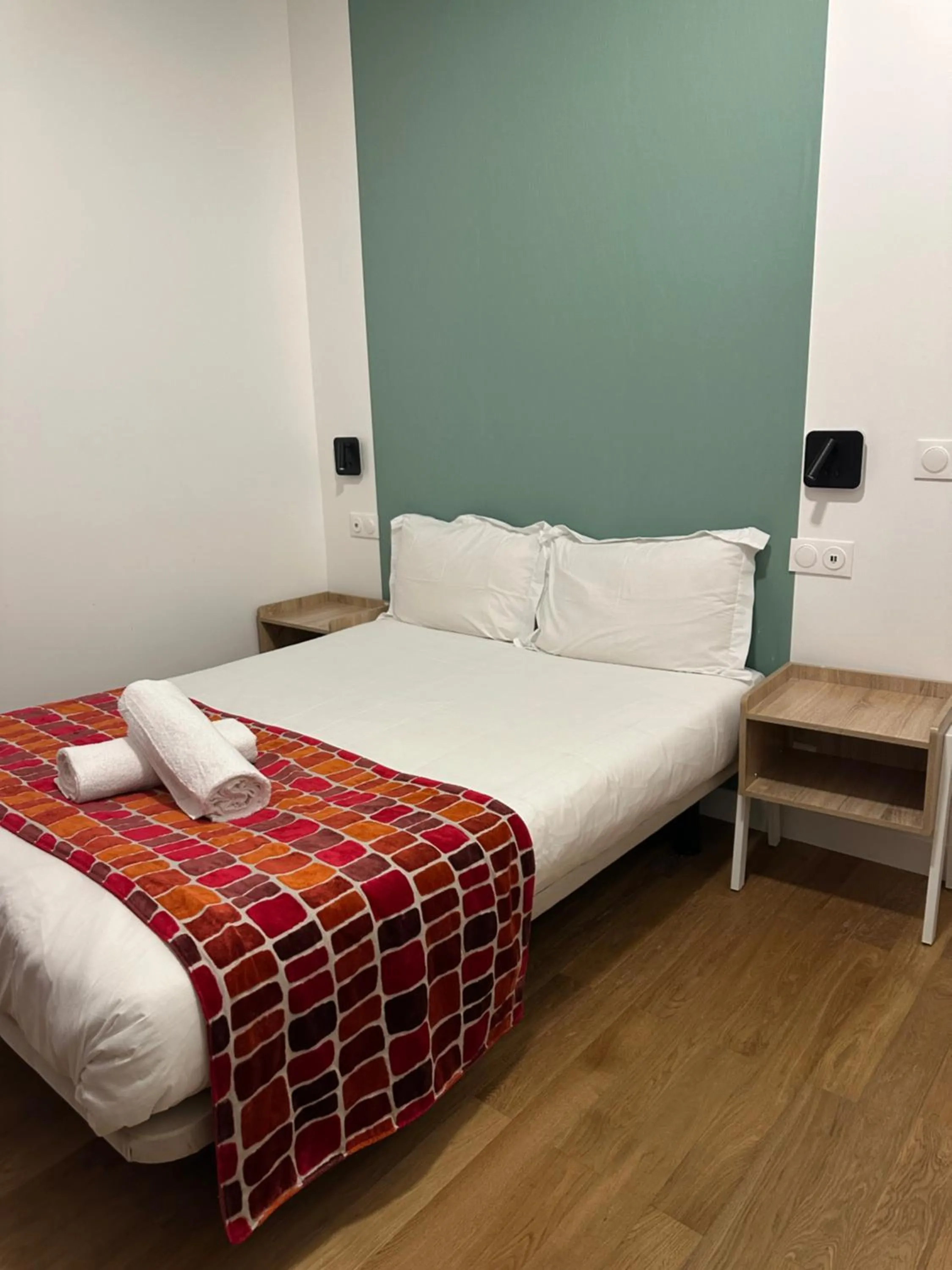 Bed in Hotel Paris Bruxelles