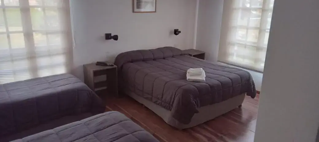 Triple Room in Hostería Cumbres Blancas Triple Room in Hostería Cumbres Blancas