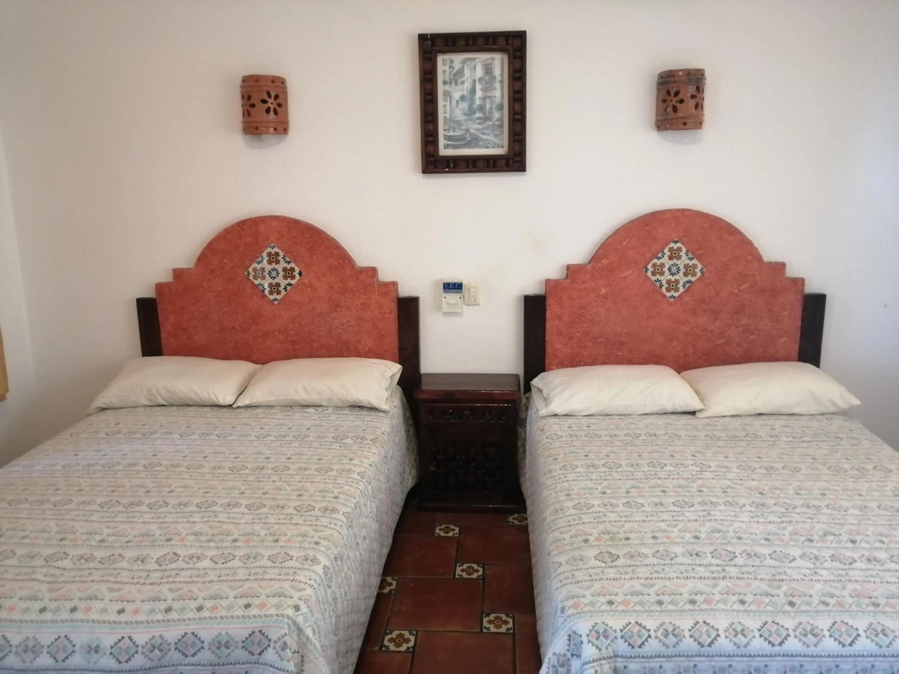 Bed in Hotel Villa Palmeras