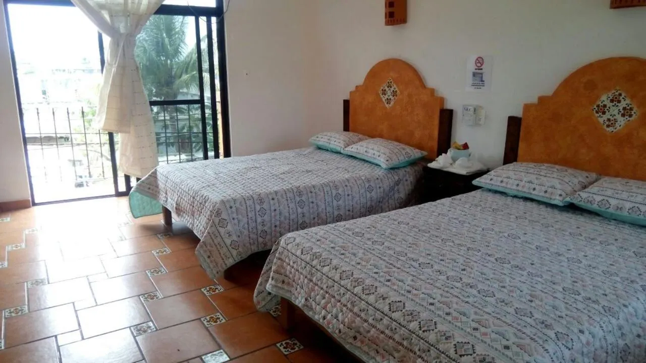 Bed in Hotel Villa Palmeras