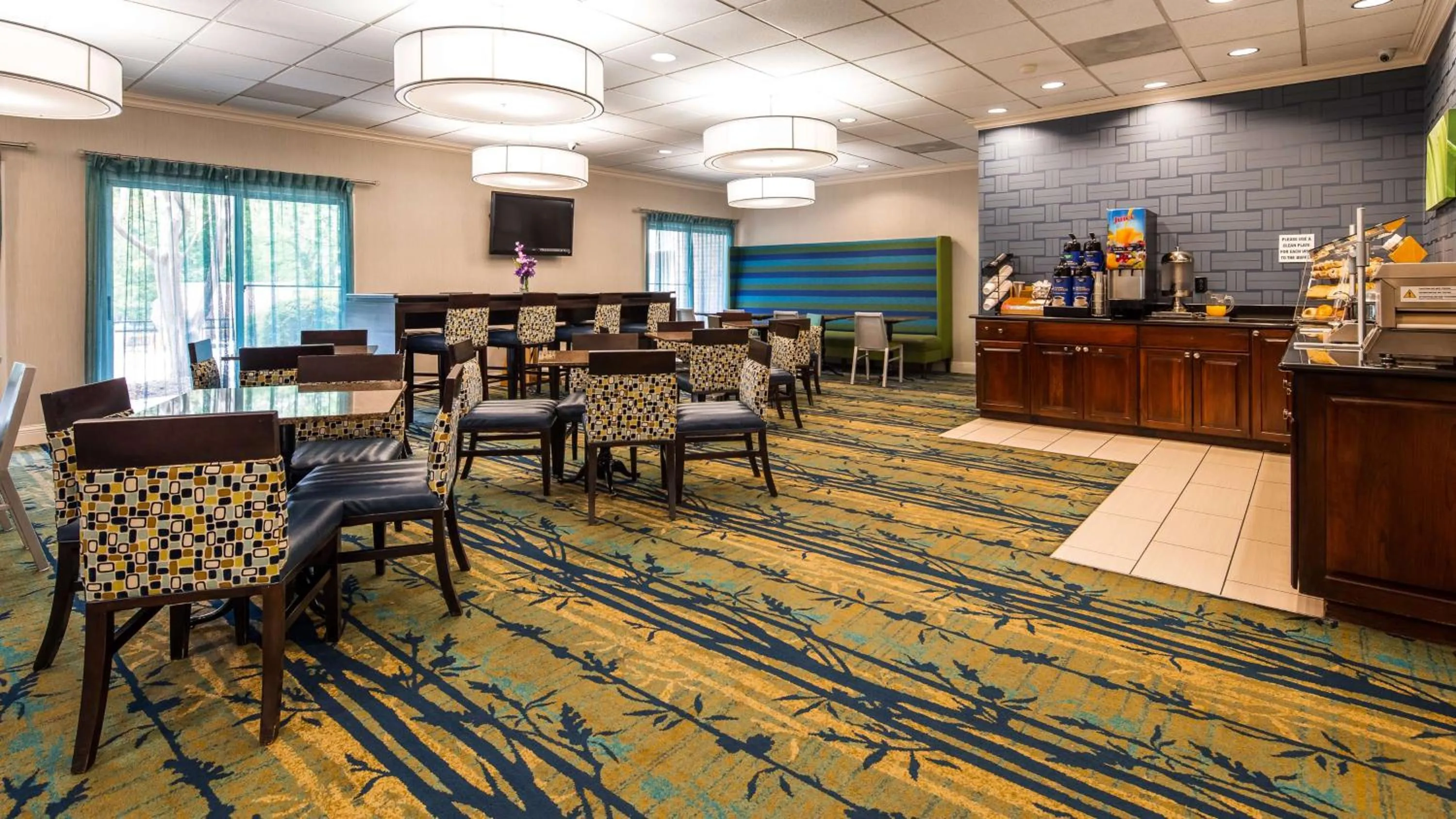 Restaurant/Places to Eat in SureStay Plus Hotel by Best Western Raleigh North Downtown