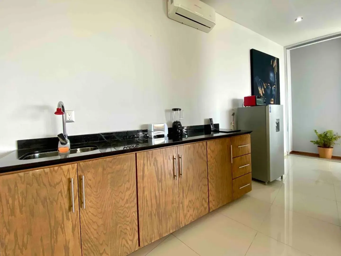 Kitchen or kitchenette in Suites La Gloria Alojamiento independiente