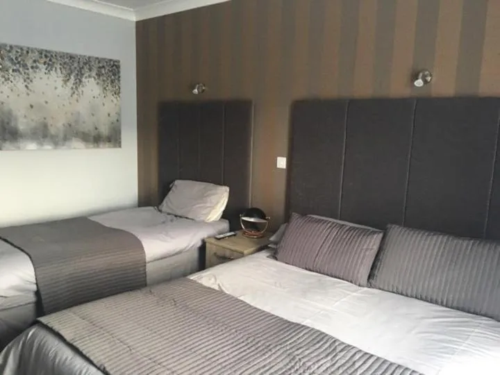 Bed in The Marquis Inn