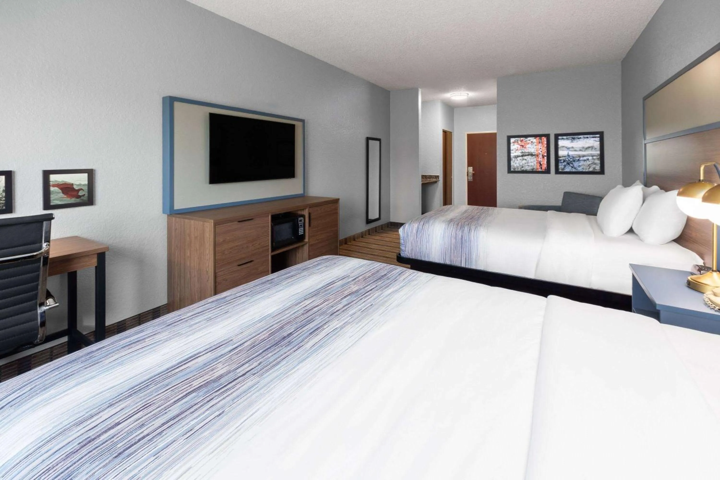 Photo of the whole room, Bed in AmericInn by Wyndham Grinnell