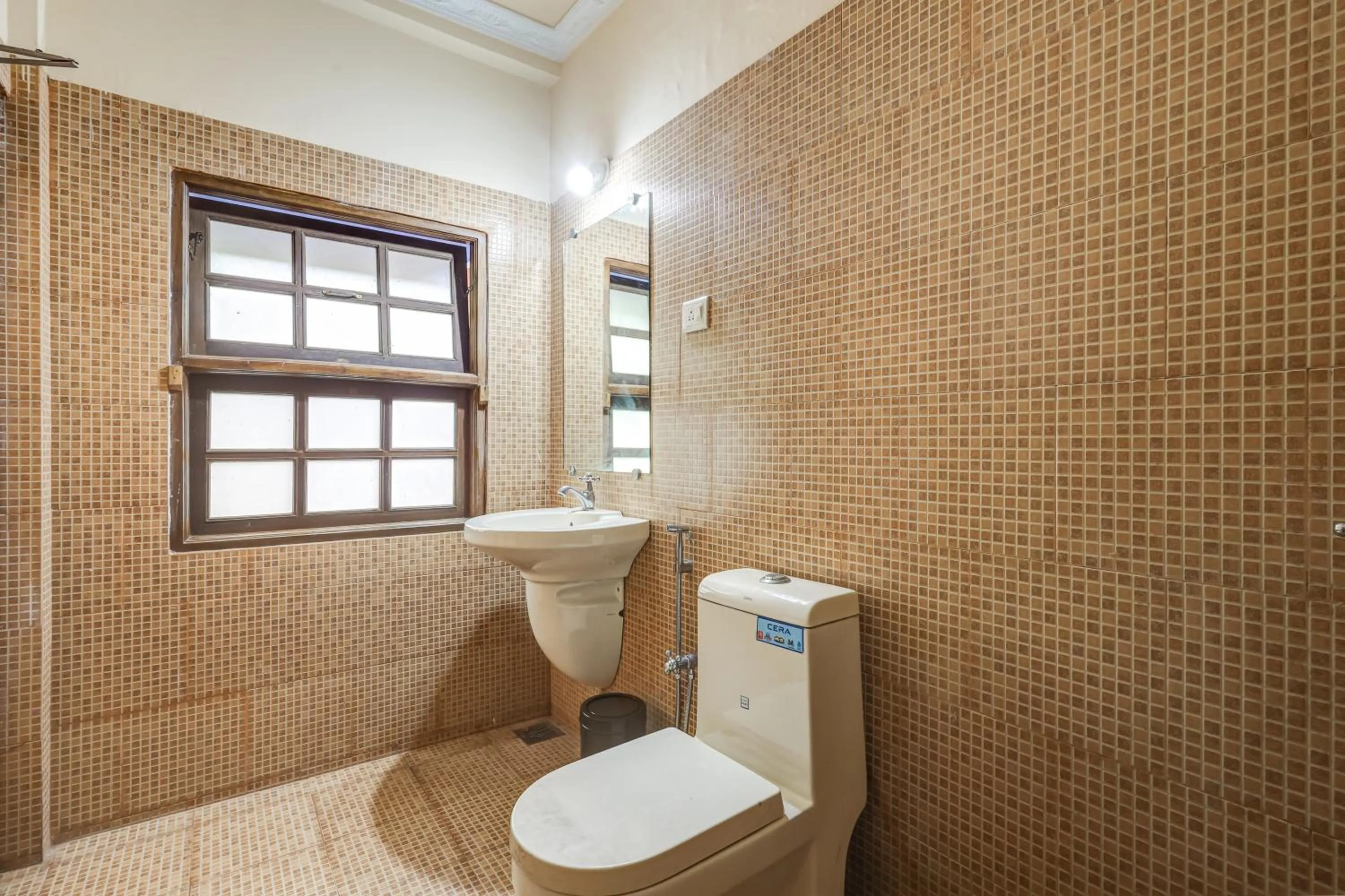 Toilet in Mayflower Beach Resort