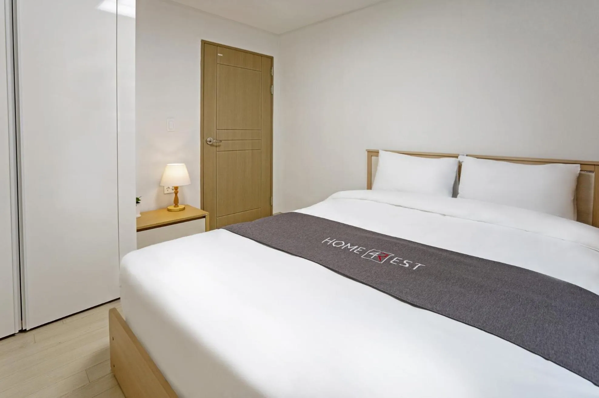 Bed in Home Fourest Residence Hotel Okpo