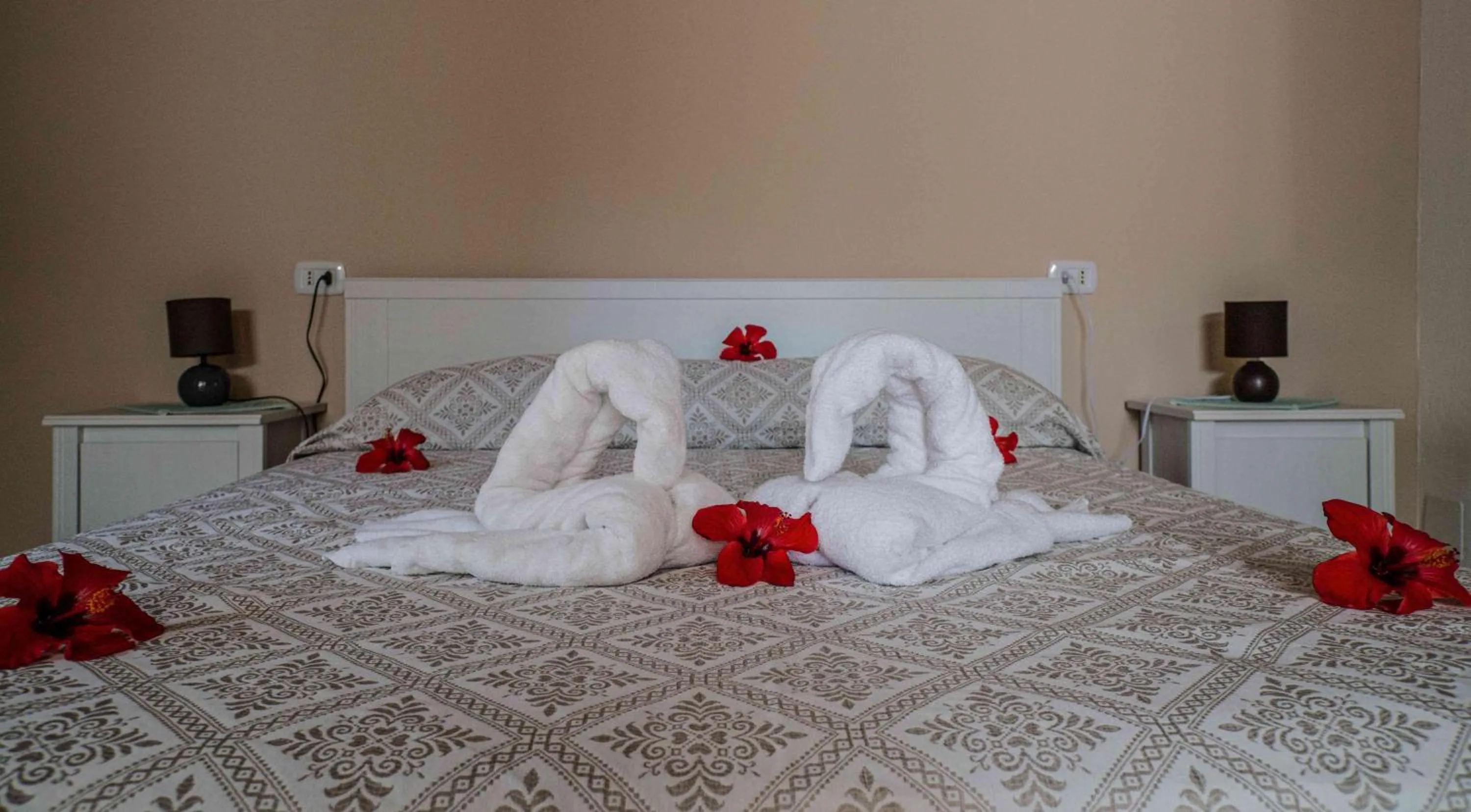 Bed in Hotel L'Oleandro