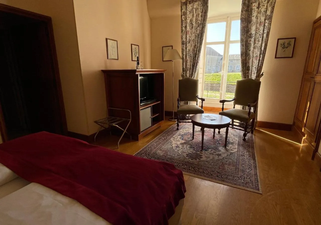 Living room, Bed in Hapimag Château de Chabenet