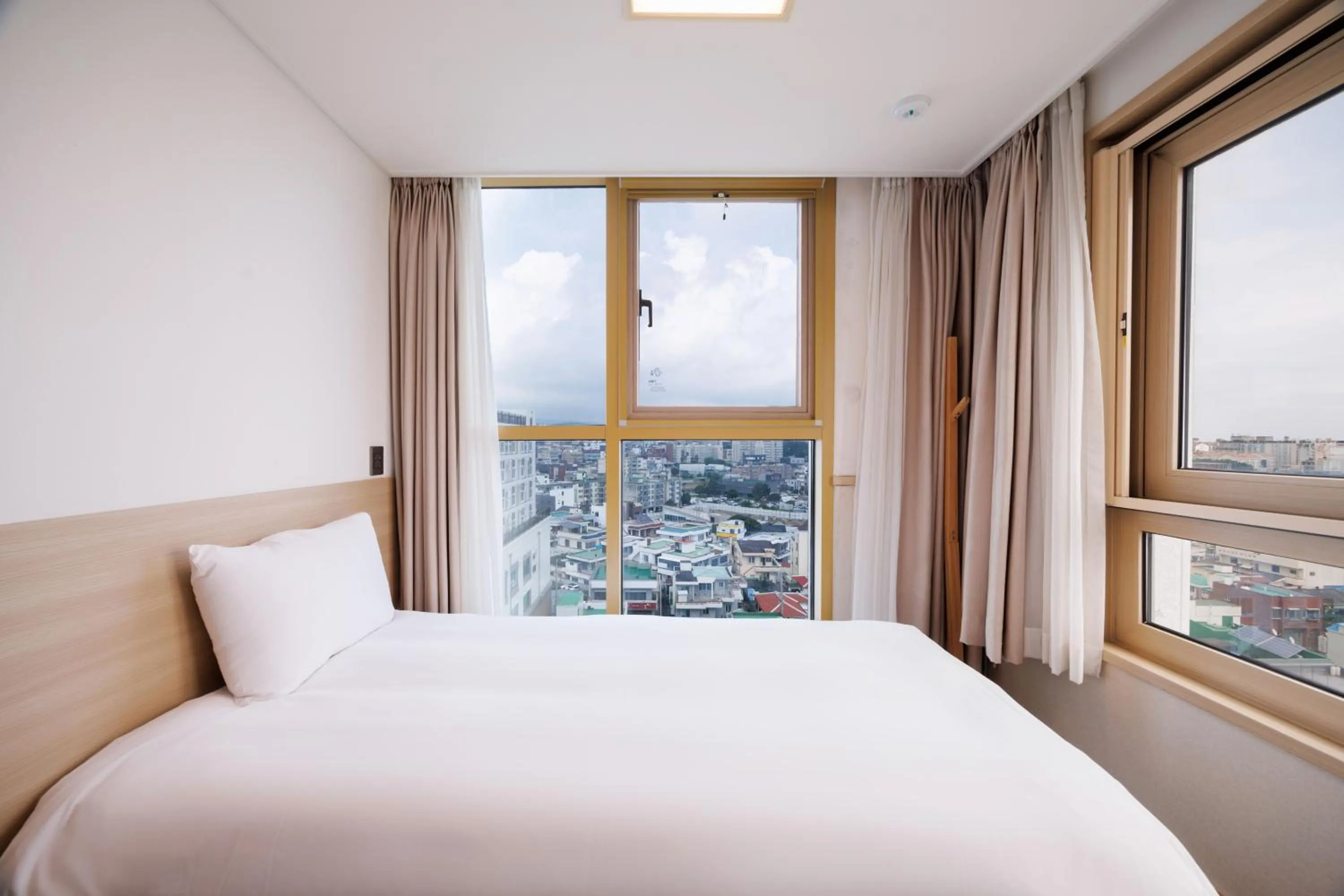 Bed in Kenny Stay Jeju Seogwipo