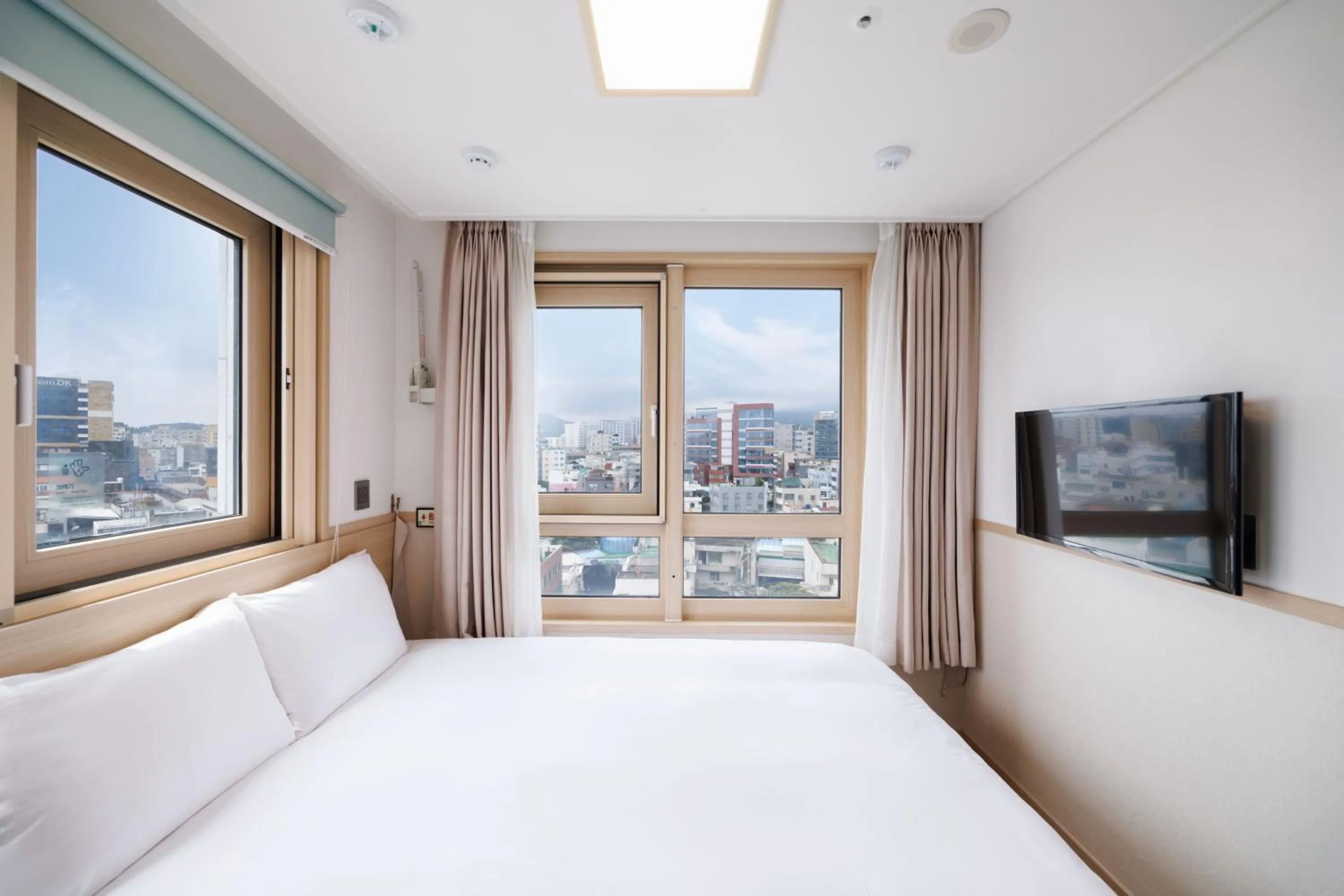 Bed in Kenny Stay Jeju Seogwipo