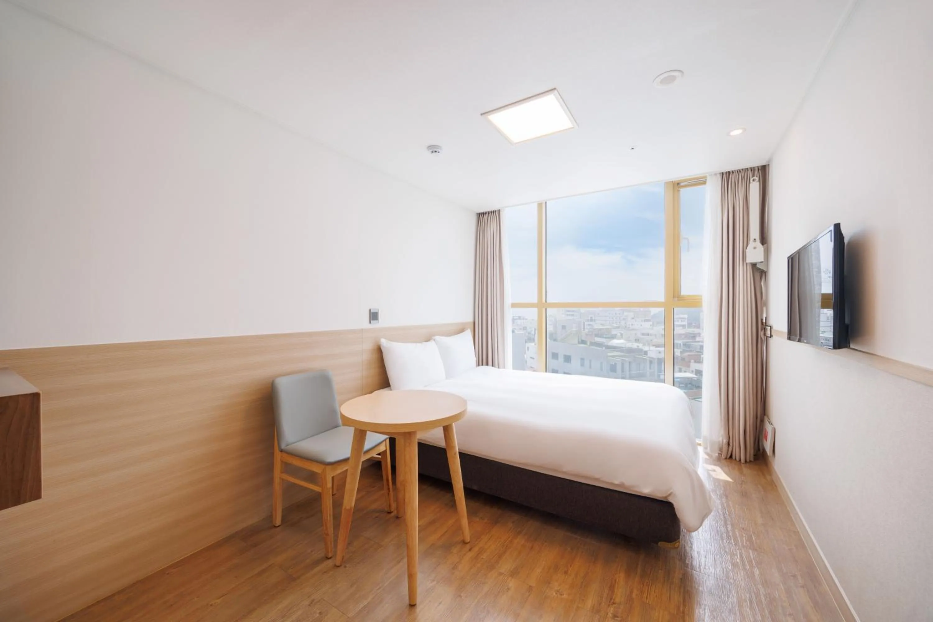 Bedroom, Bed in Kenny Stay Jeju Seogwipo