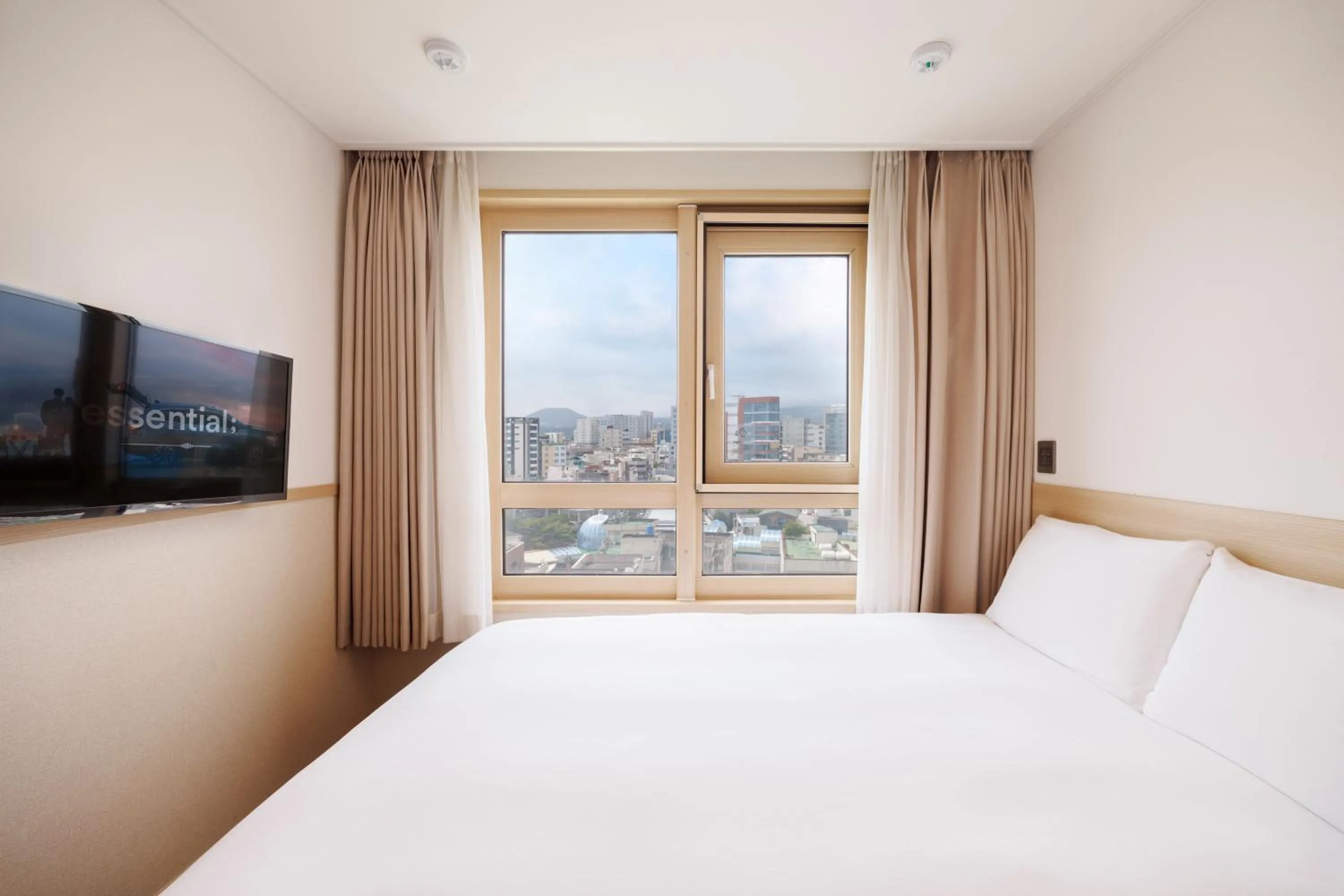View (from property/room), Bed in Kenny Stay Jeju Seogwipo