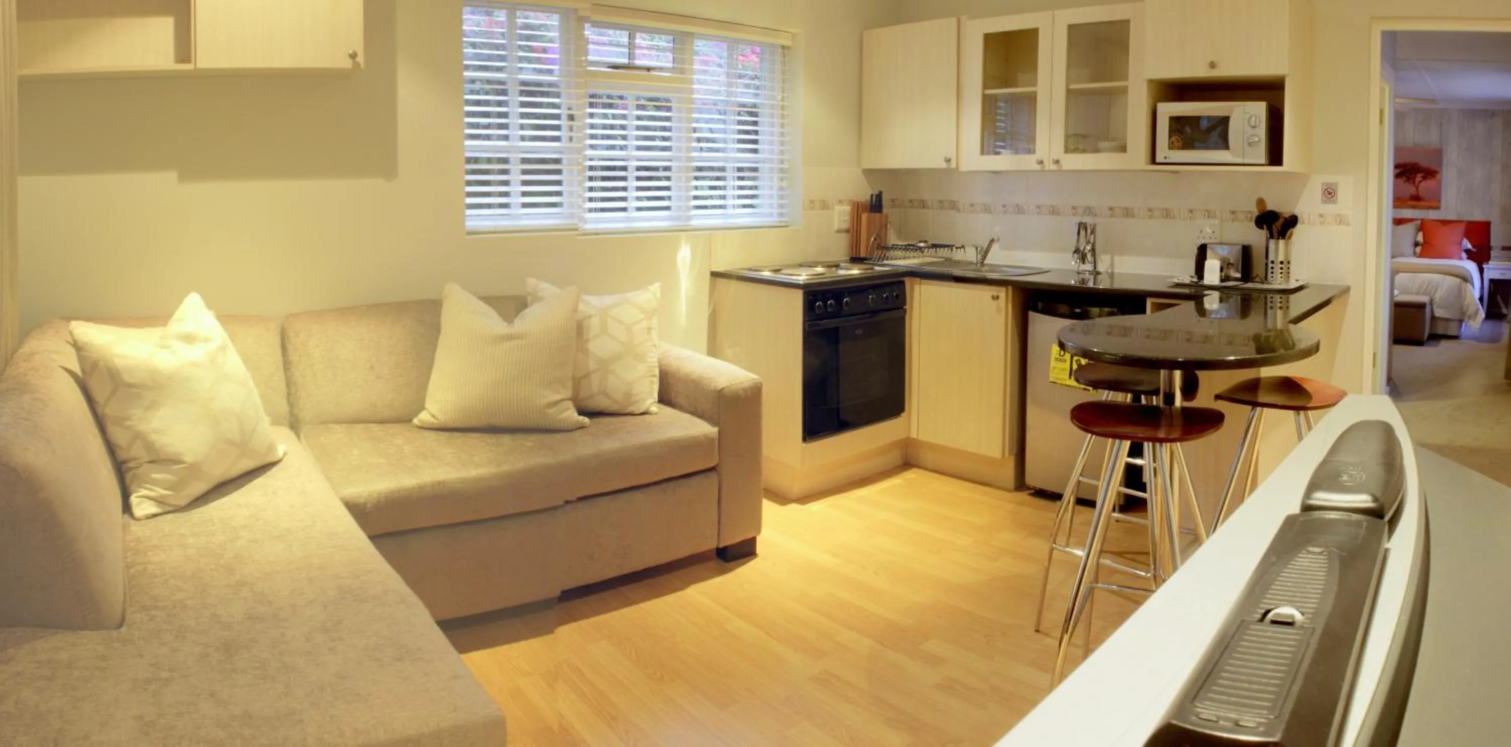 Kitchen or kitchenette in Lodge on Main Guest House and Conference Centre