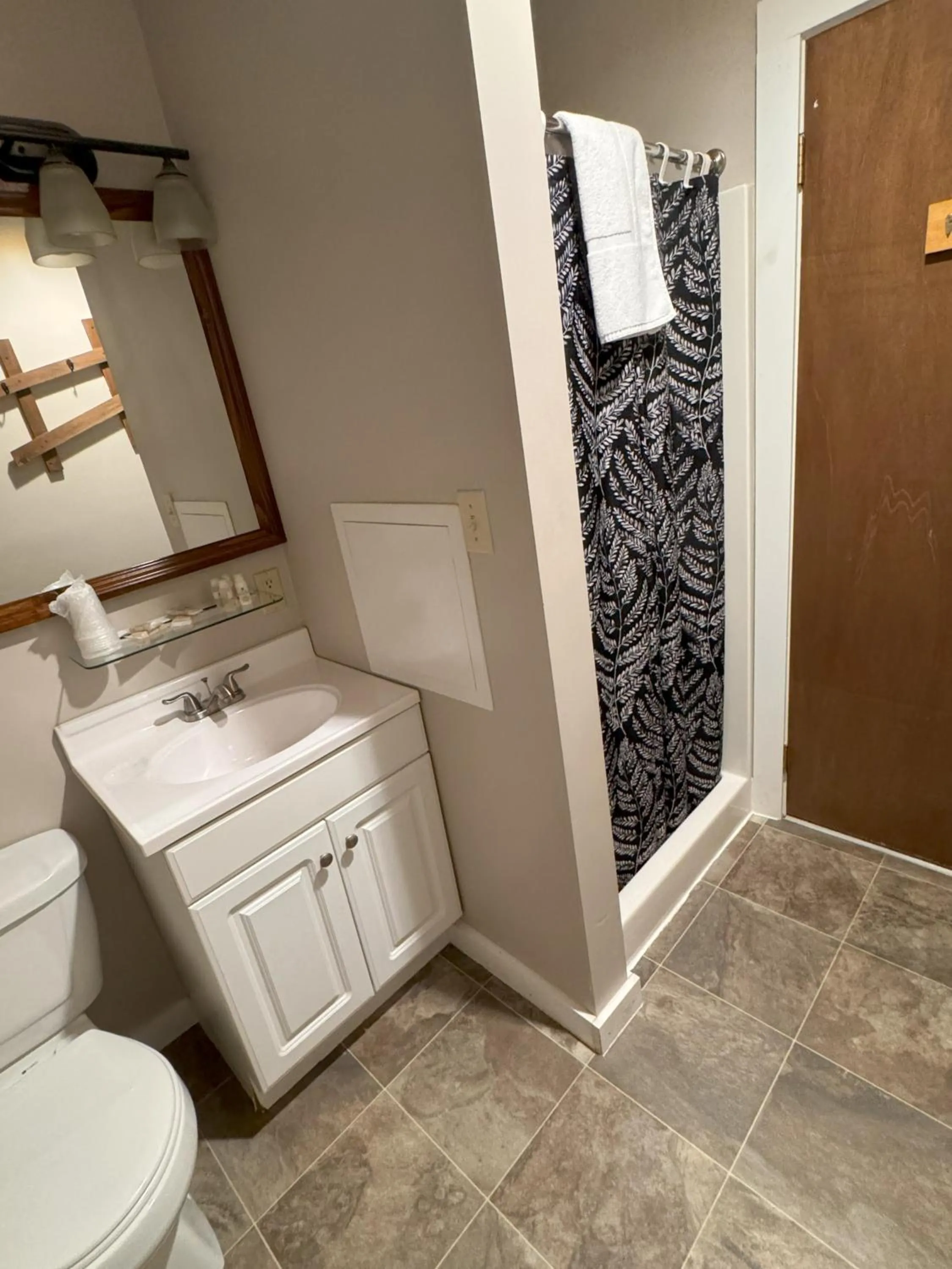 Bathroom in Lake Ontario Motel & Inn