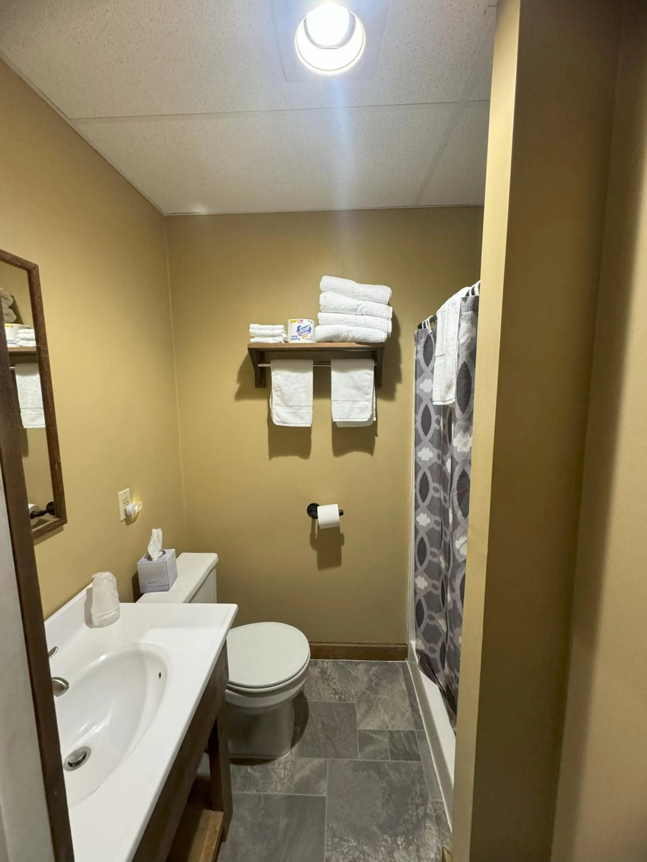 Bathroom in Lake Ontario Motel & Inn