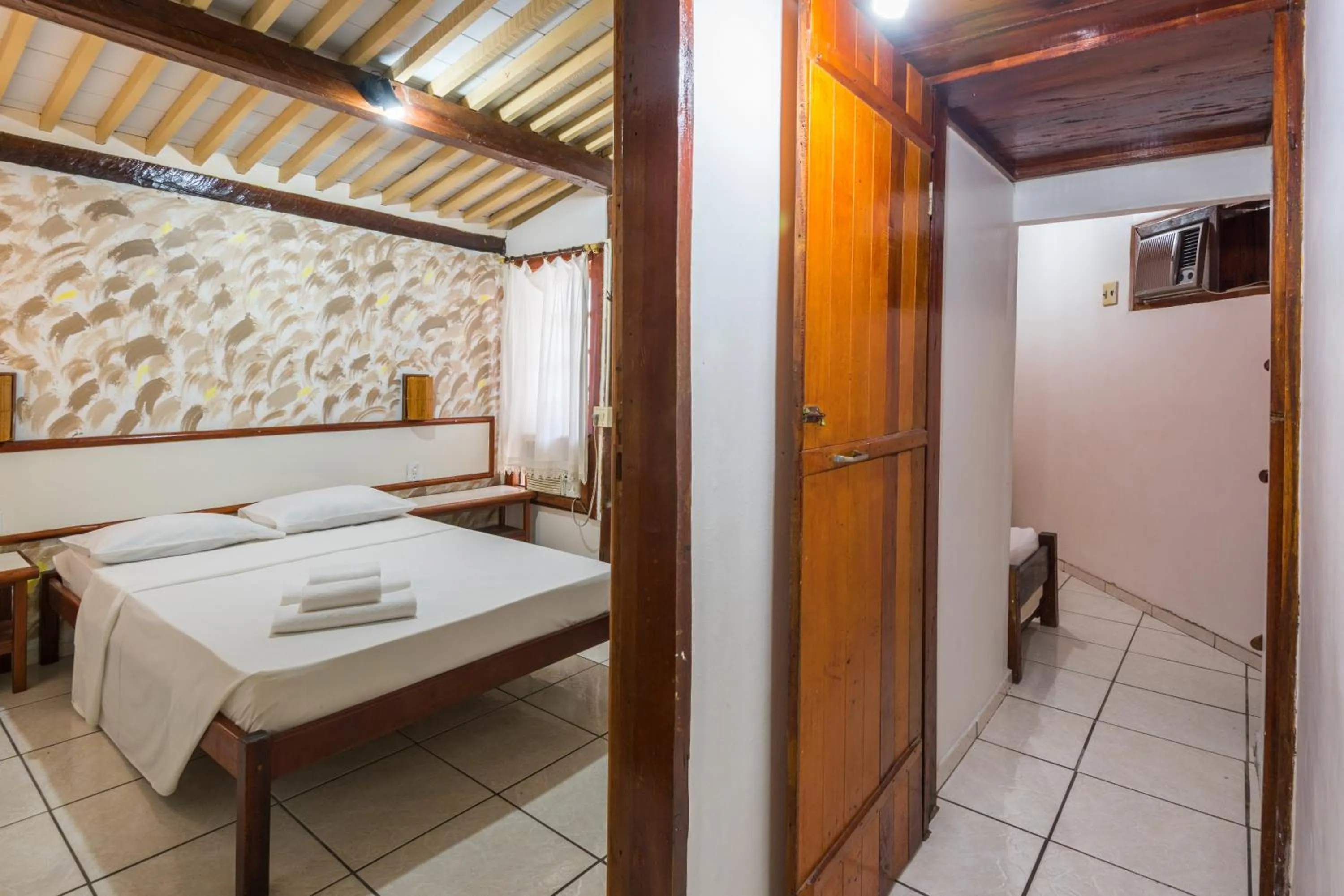 Bed in Pousada Aldeia Portuguesa