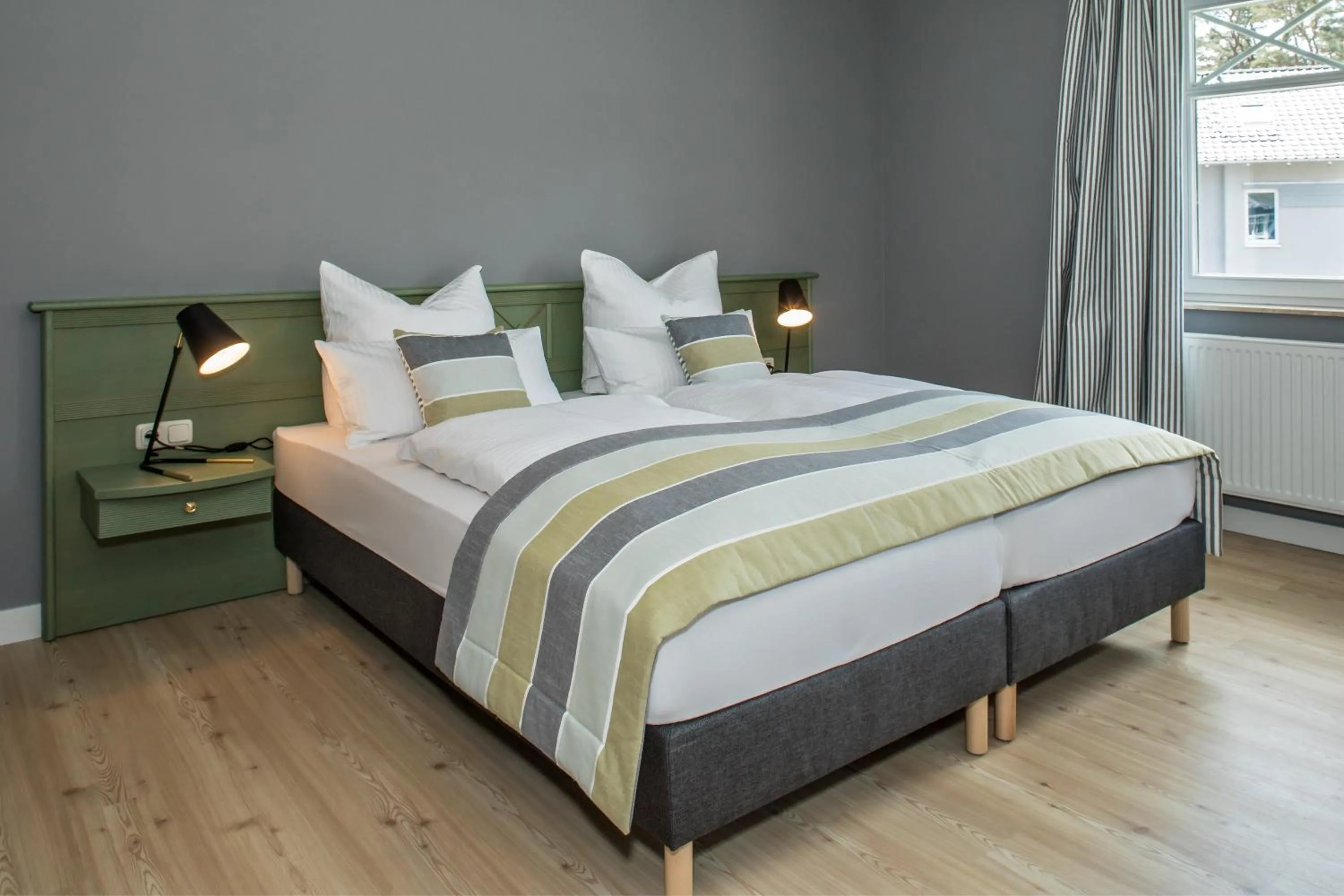 Bed in Upstalsboom Hotel Strandidyll