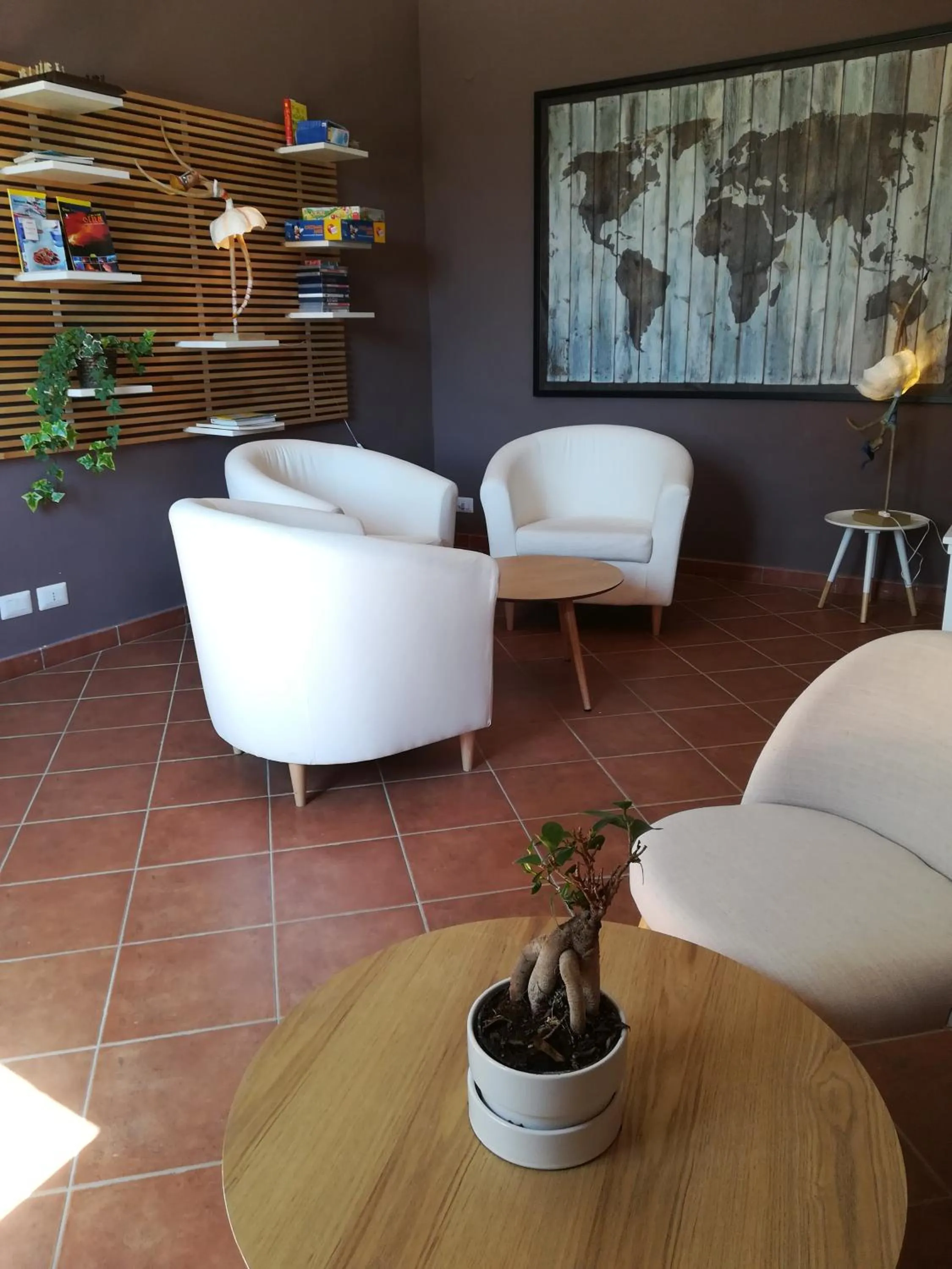 Communal lounge/ TV room in Giardino Arancio