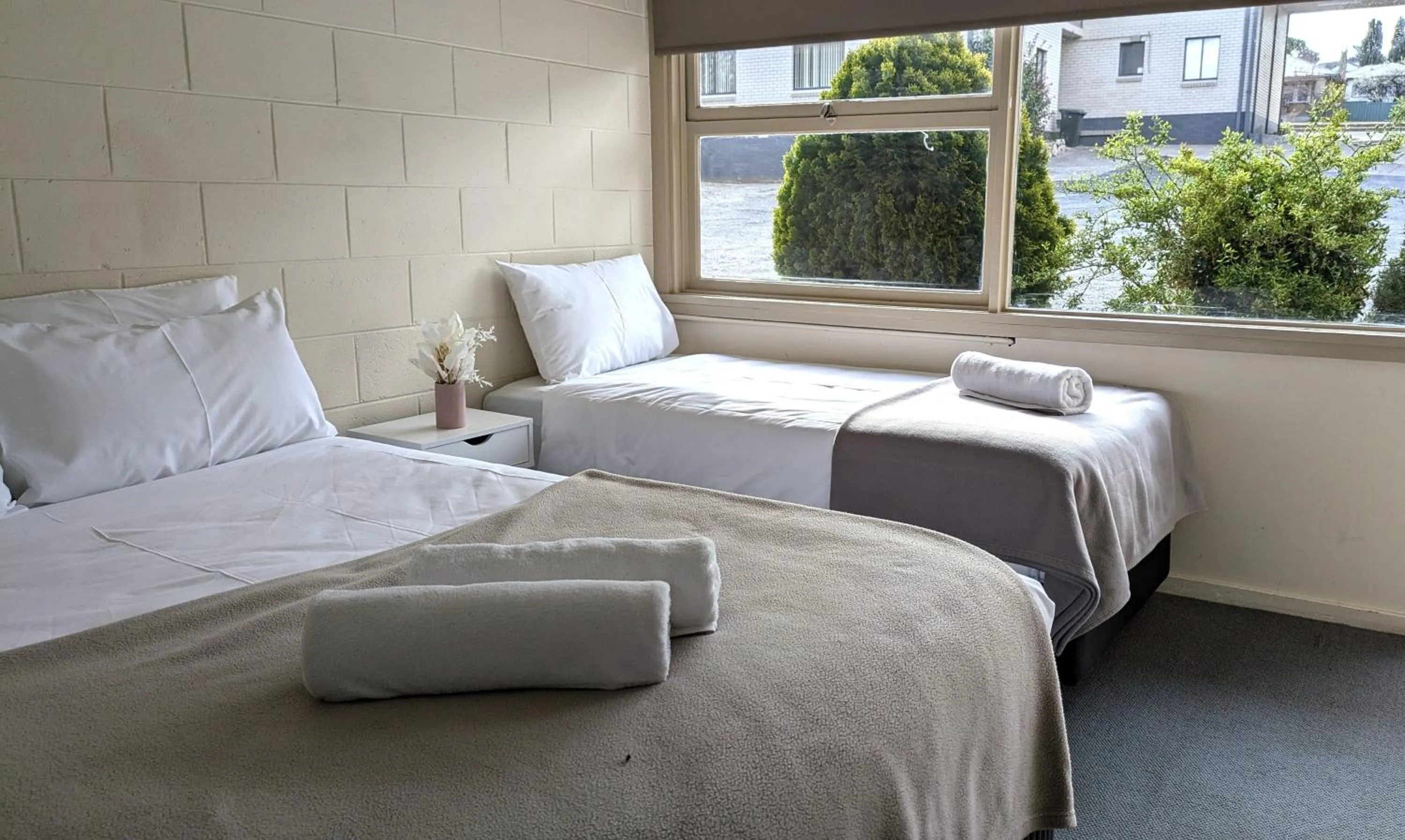 Bed in The Swiss Motel