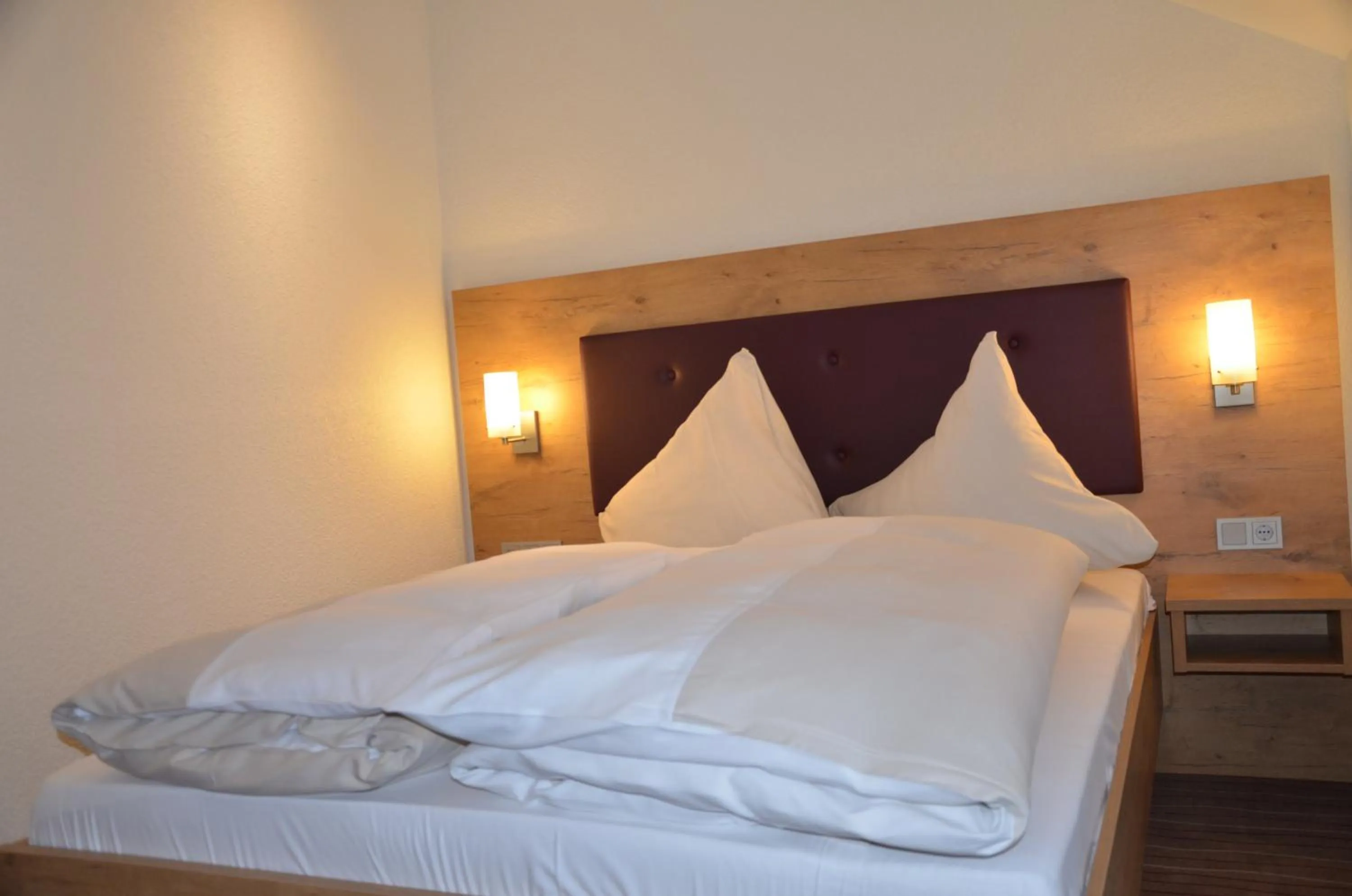 Photo of the whole room, Bed in Hotel- Restaurant Poststuben