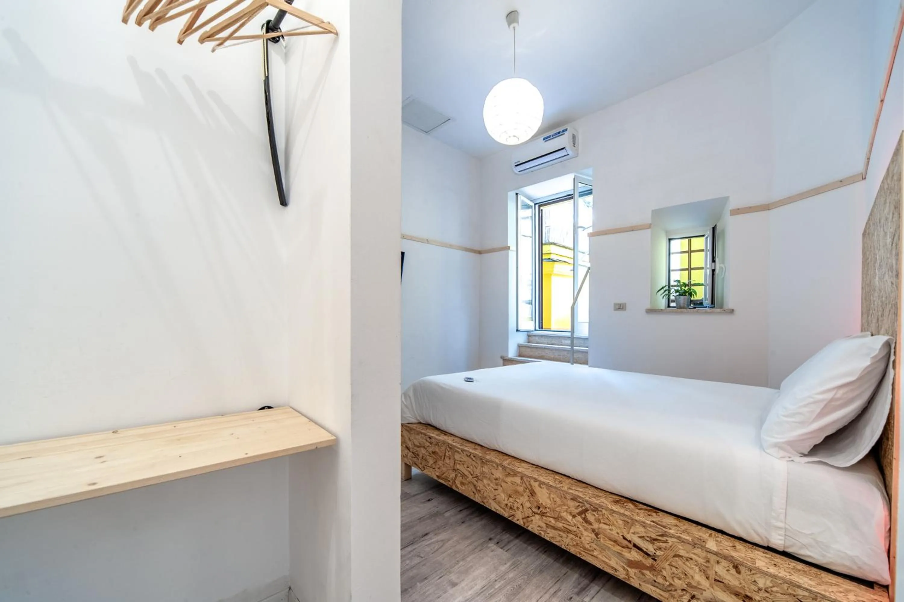 Bed in SmooRoomS Roma Ostiense