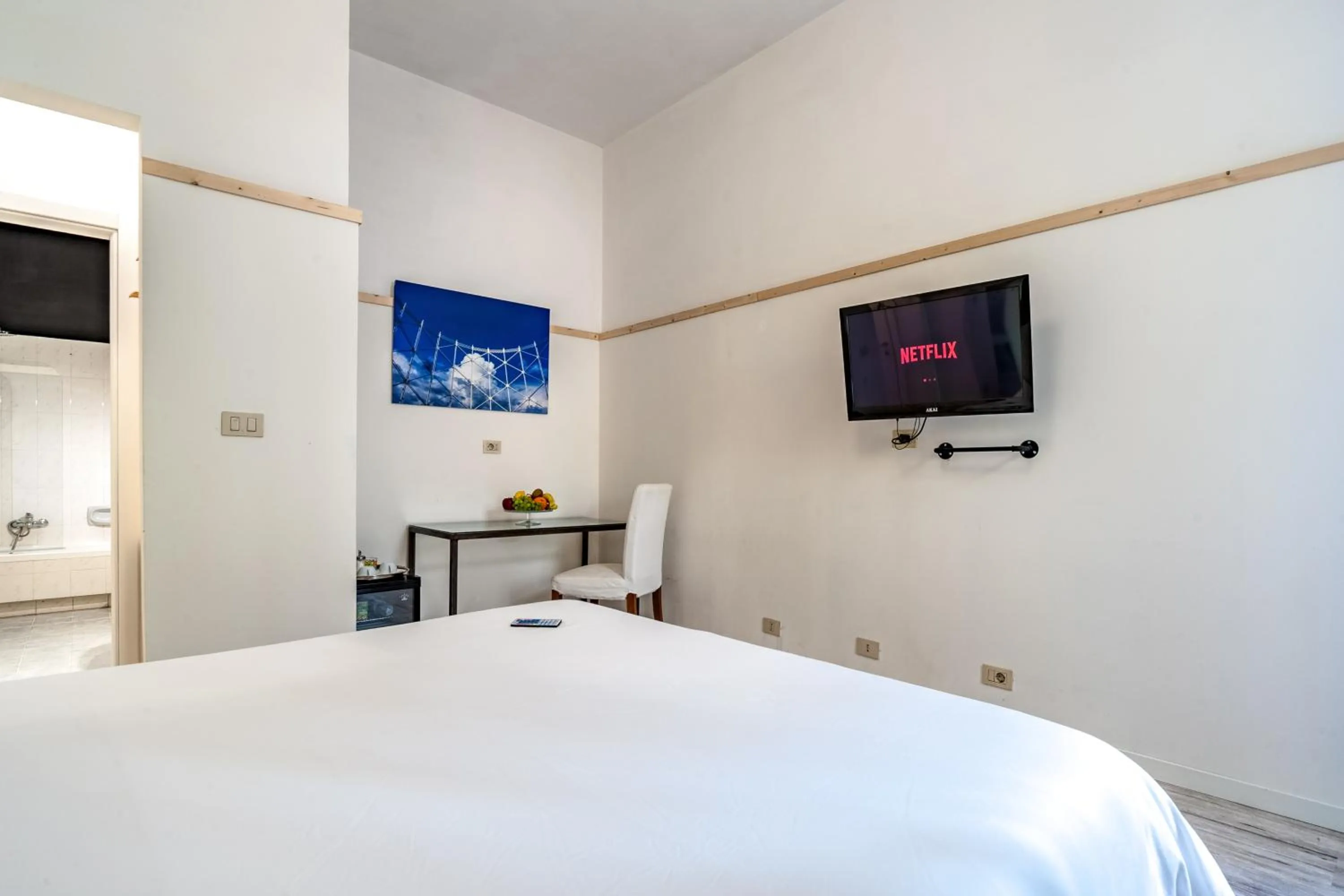 TV and multimedia, Bed in SmooRoomS Roma Ostiense