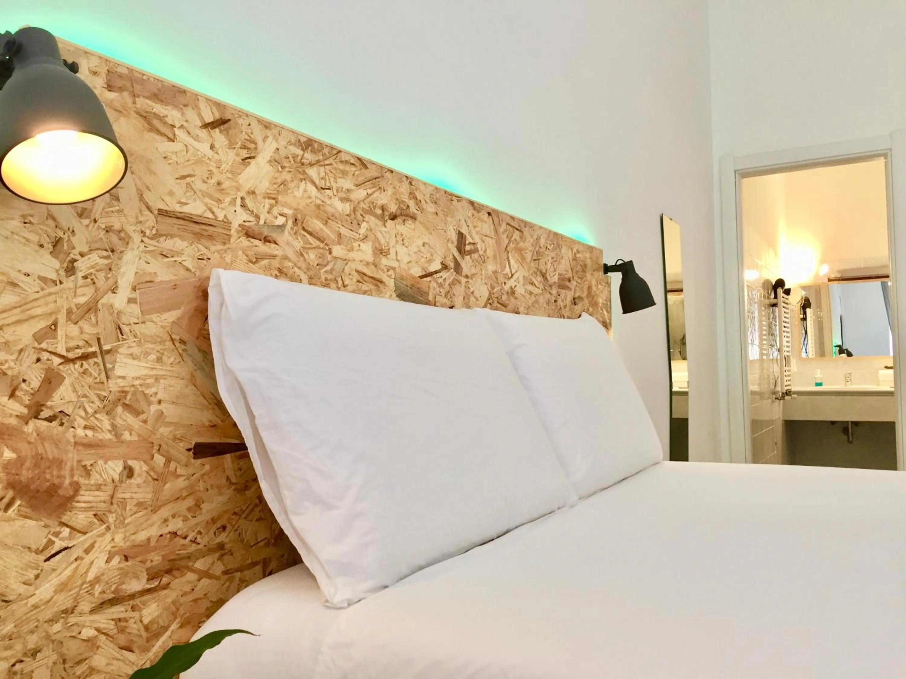 Bed in SmooRoomS Roma Ostiense