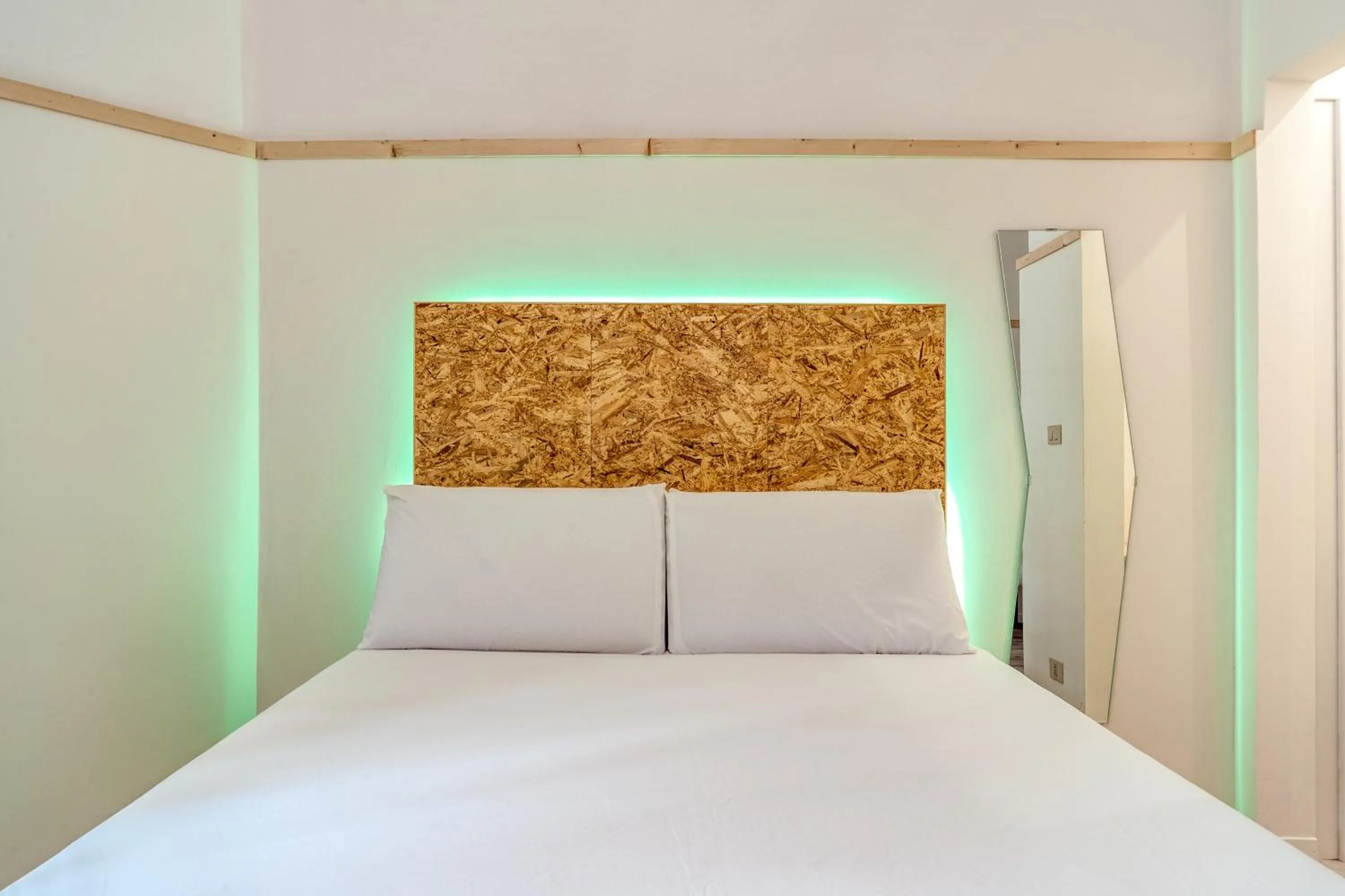 Bed in SmooRoomS Roma Ostiense