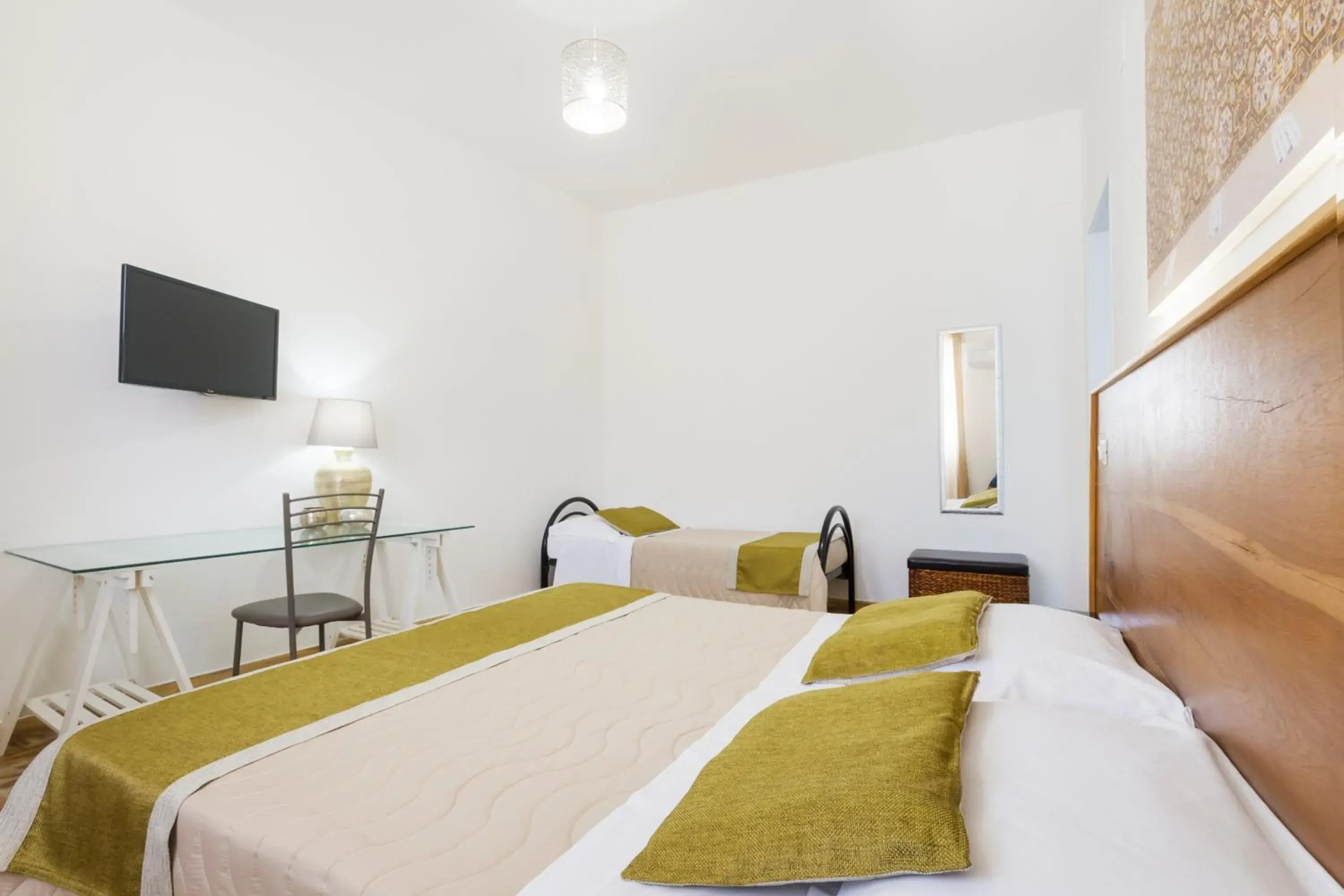 Comfort Triple Room - single occupancy in B&B Villa Ginevra Comfort Triple Room - single occupancy in B&B Villa Ginevra