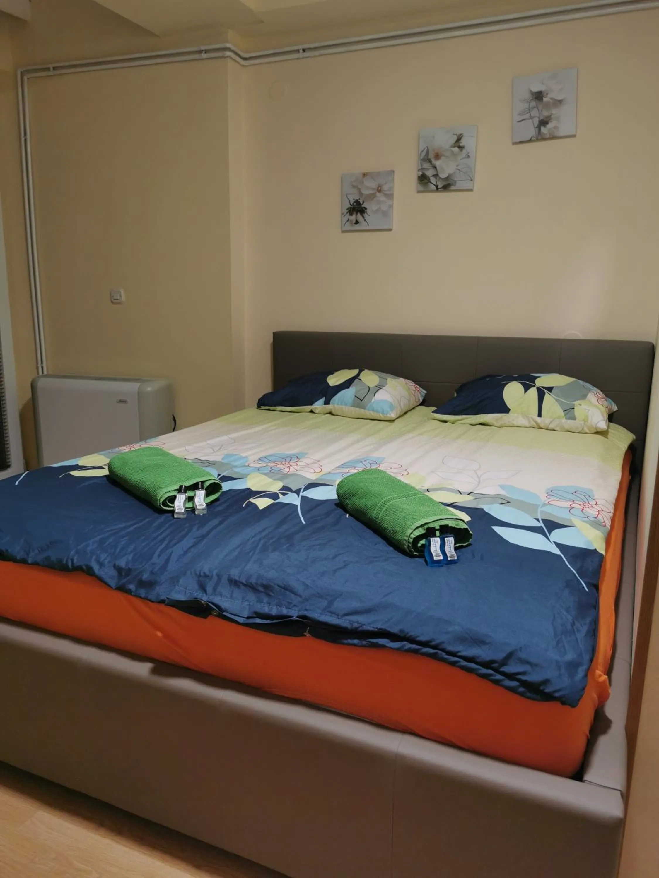 Bed in Lukanov Apartments & Guest Rooms