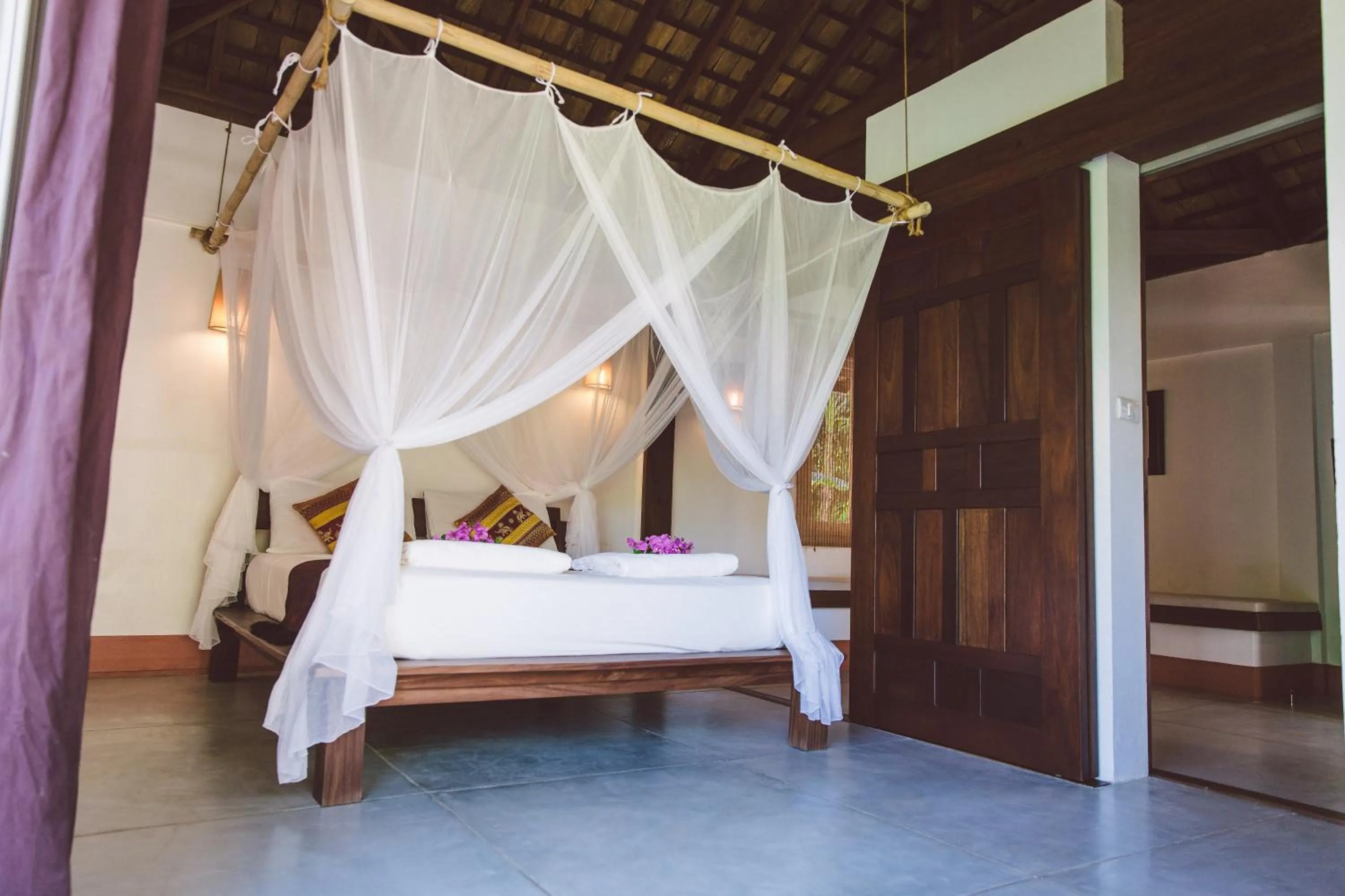 Bed in Koyao Bay Pavilions - Beach Resort and Pool Villas