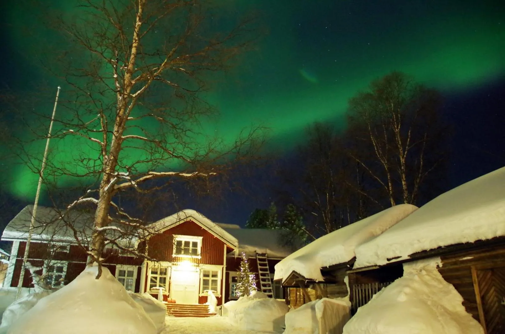 Facade/entrance in LAURI Historical Log House Manor