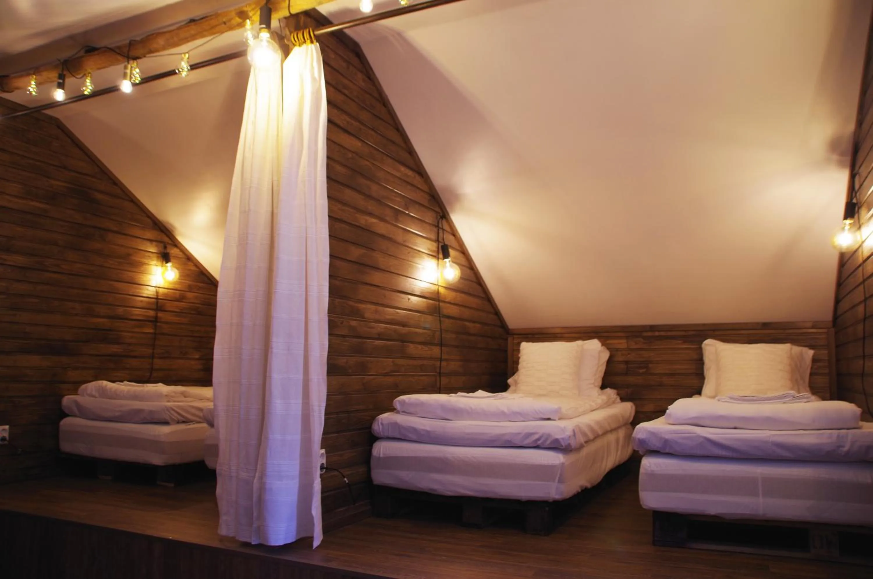 Bed in LAURI Historical Log House Manor