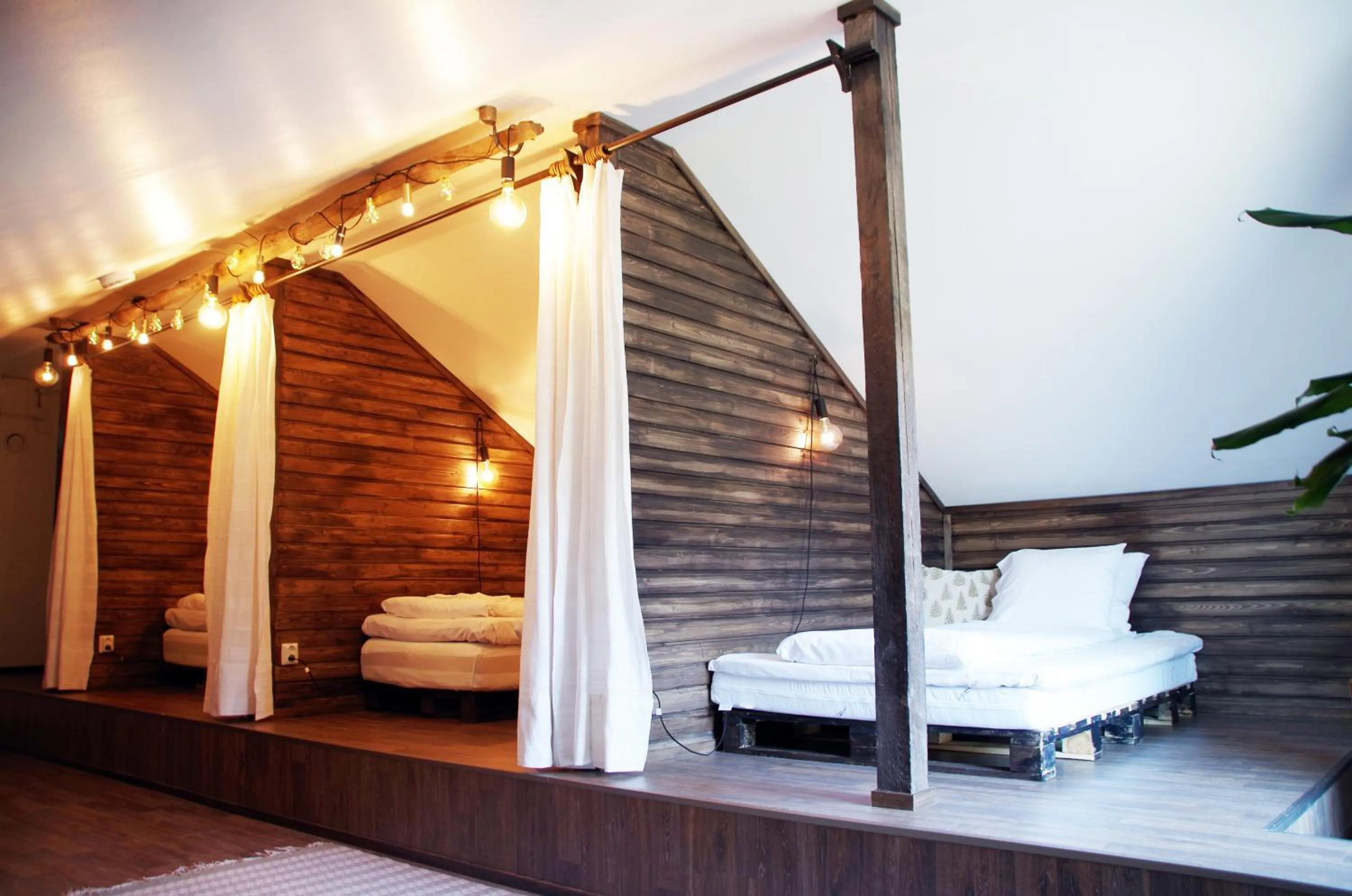 Photo of the whole room, Bed in LAURI Historical Log House Manor