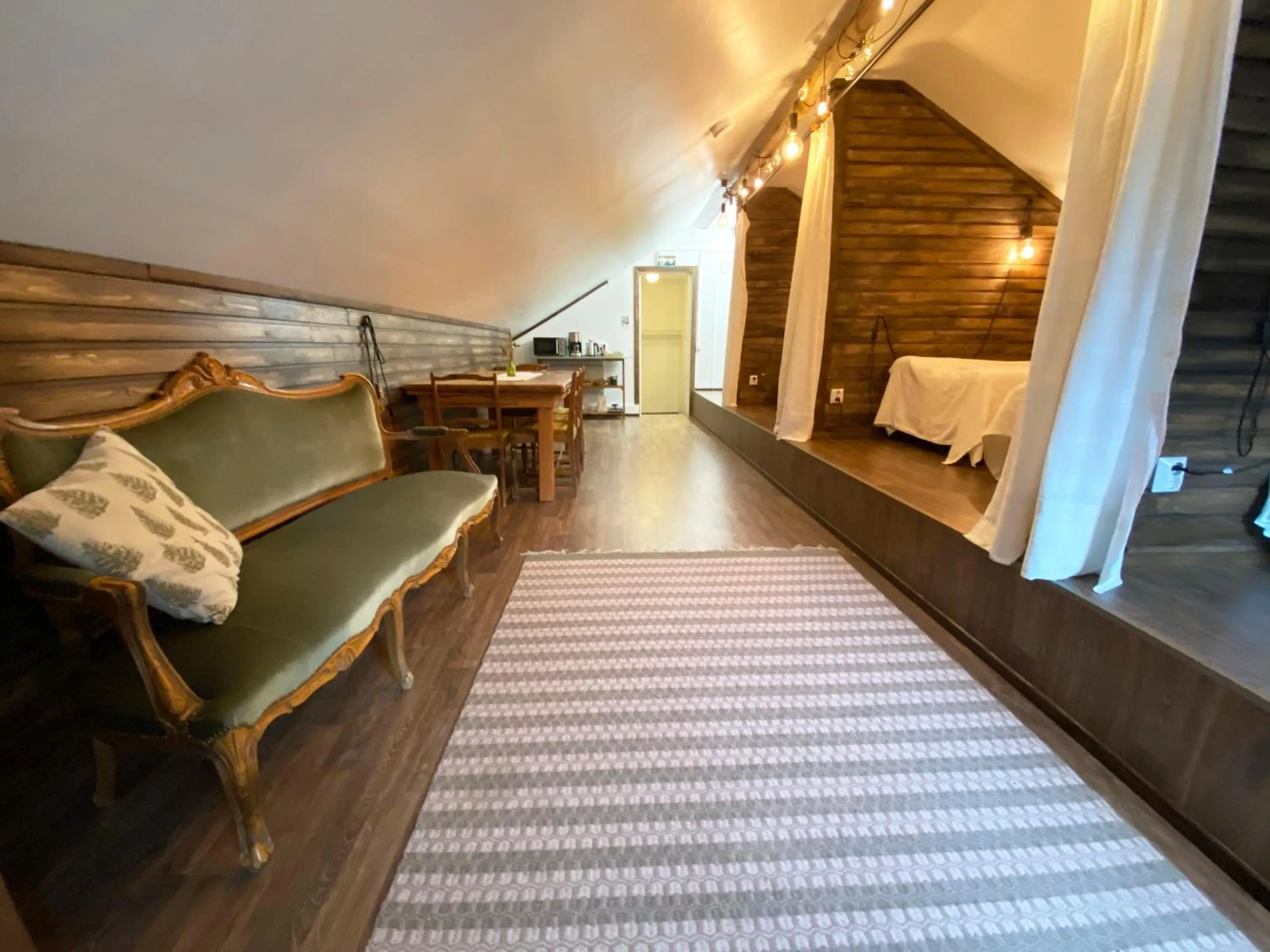 Living room, Bed in LAURI Historical Log House Manor