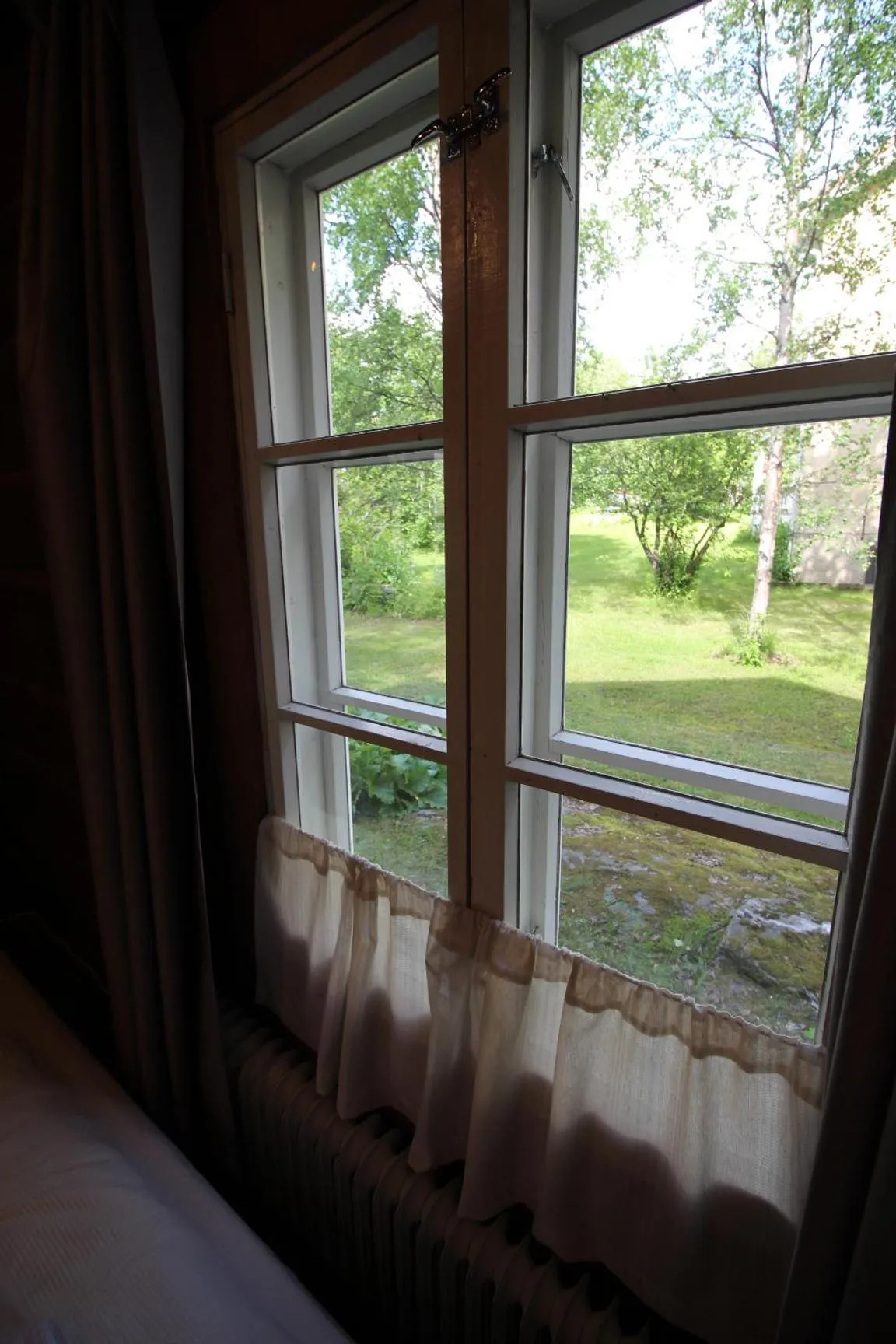 Garden view in LAURI Historical Log House Manor