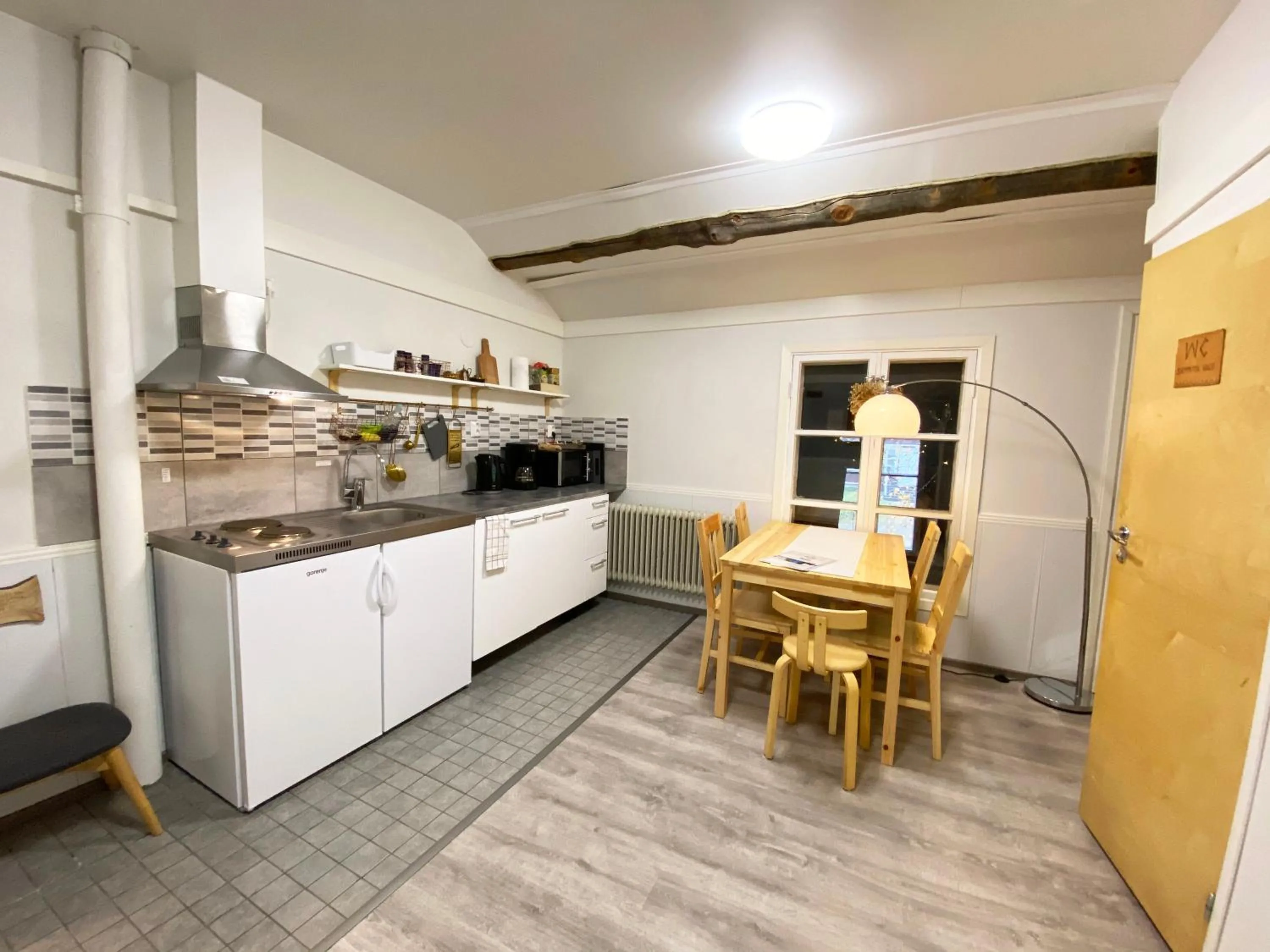 Dining area in LAURI Historical Log House Manor