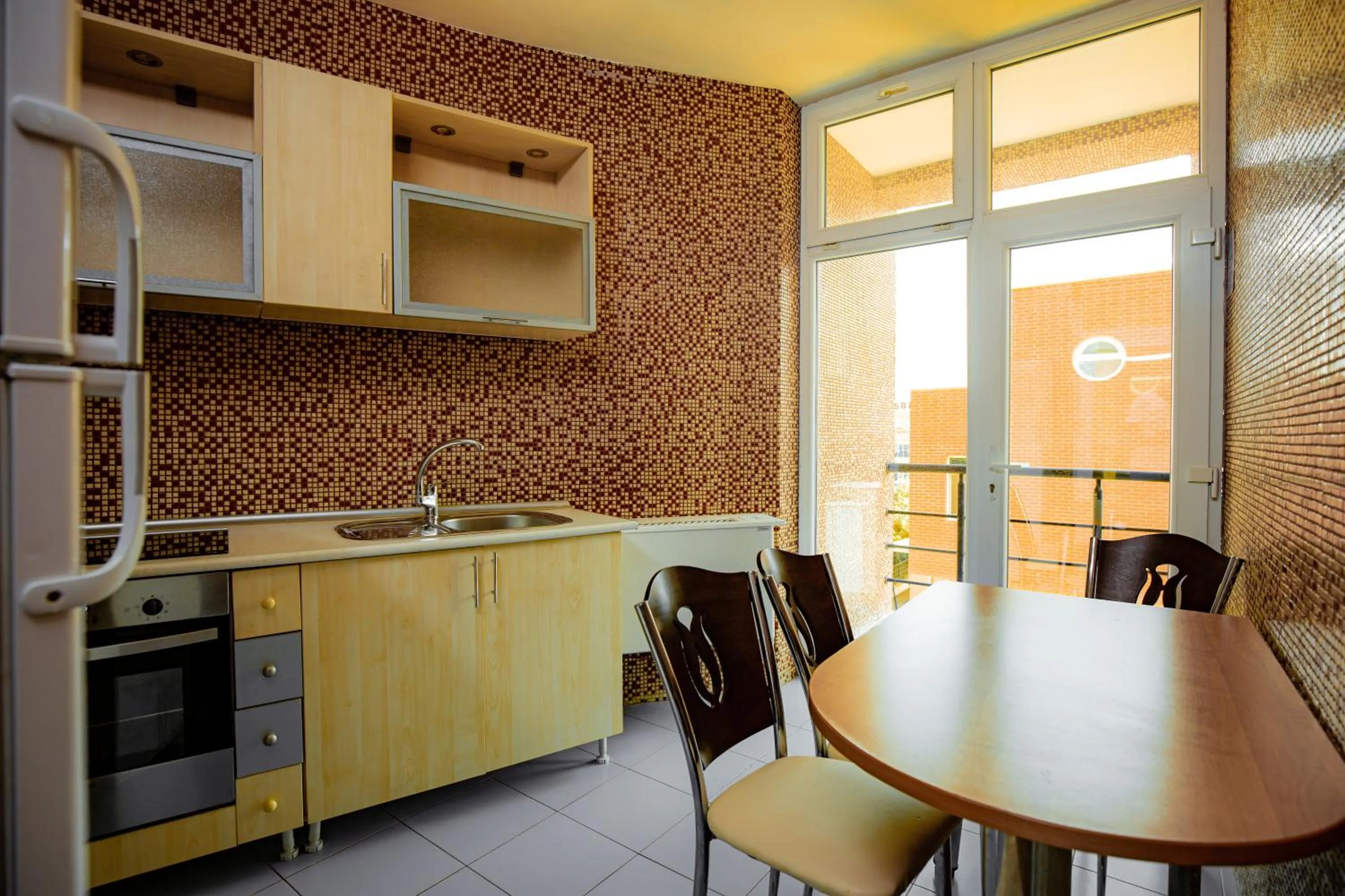 Kitchen or kitchenette in Panorama Villa Lux Hotel