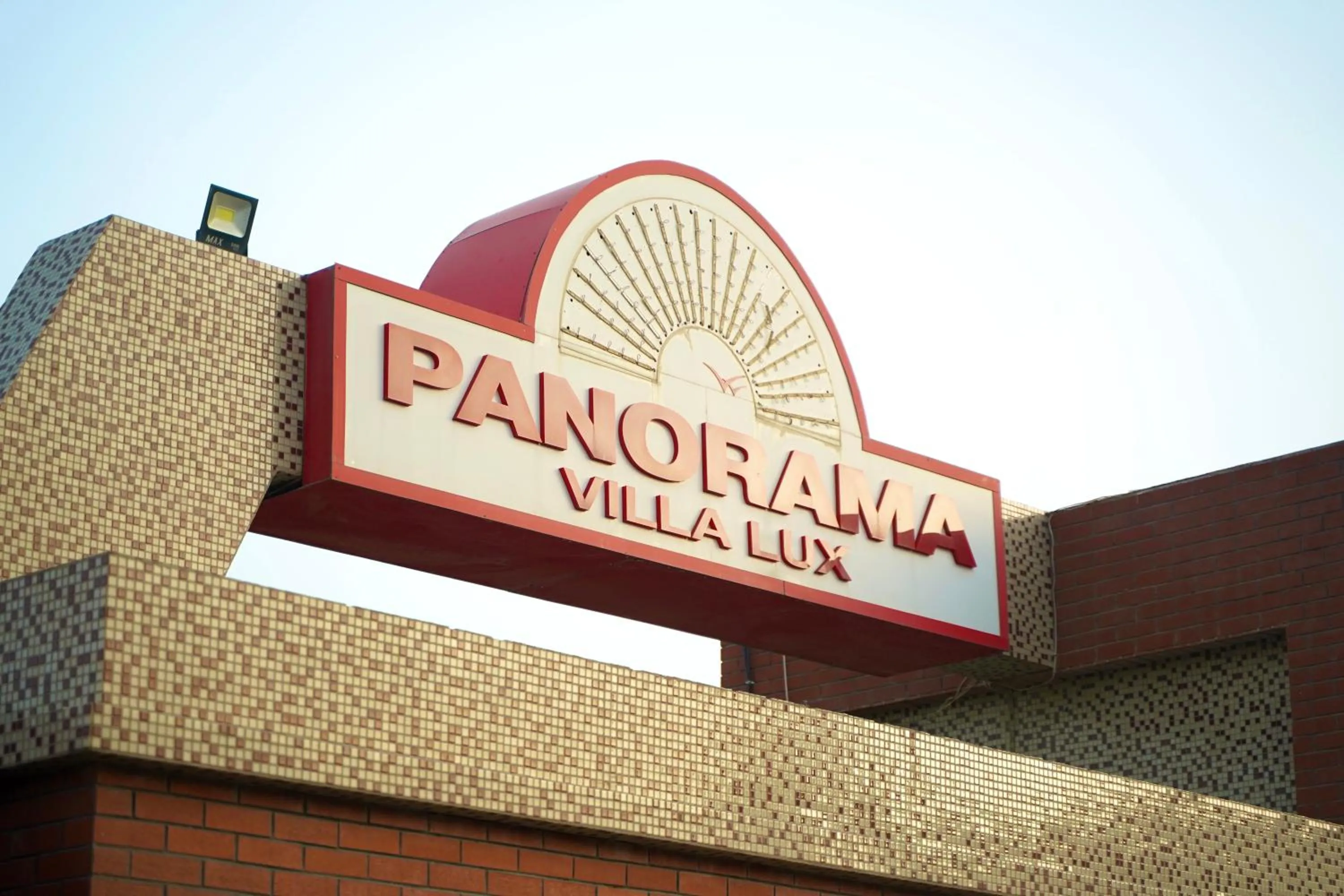 Text overlay in Panorama Villa Lux Hotel