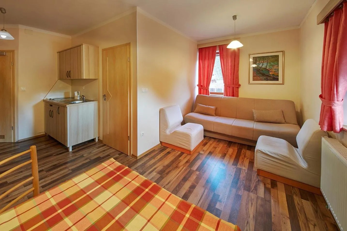 Living room, Bed in Rute Hotel and Apartments