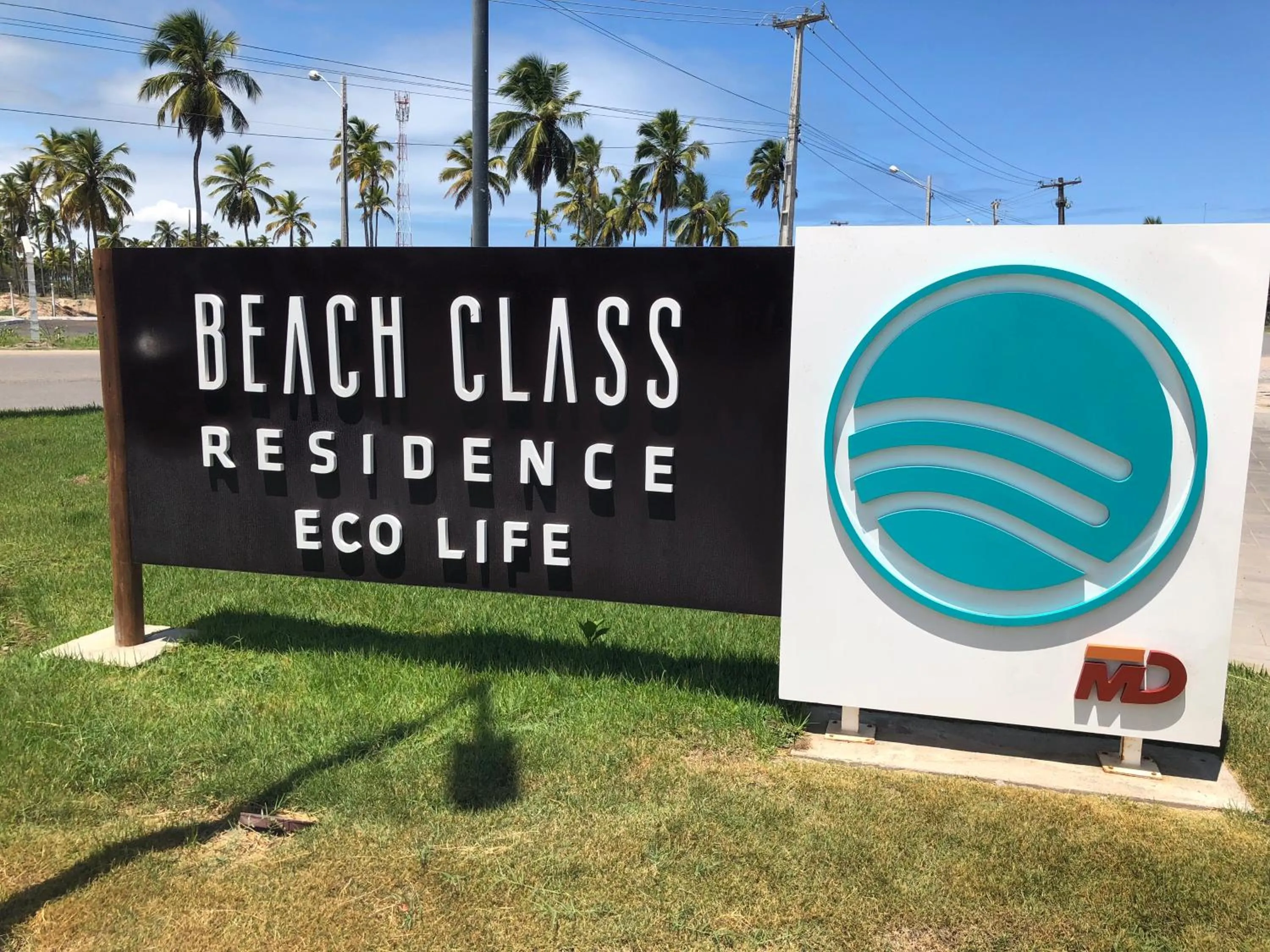 Property logo or sign in Beach Class Eco LIfe - BL 08-202 - Apartamento Inteiro