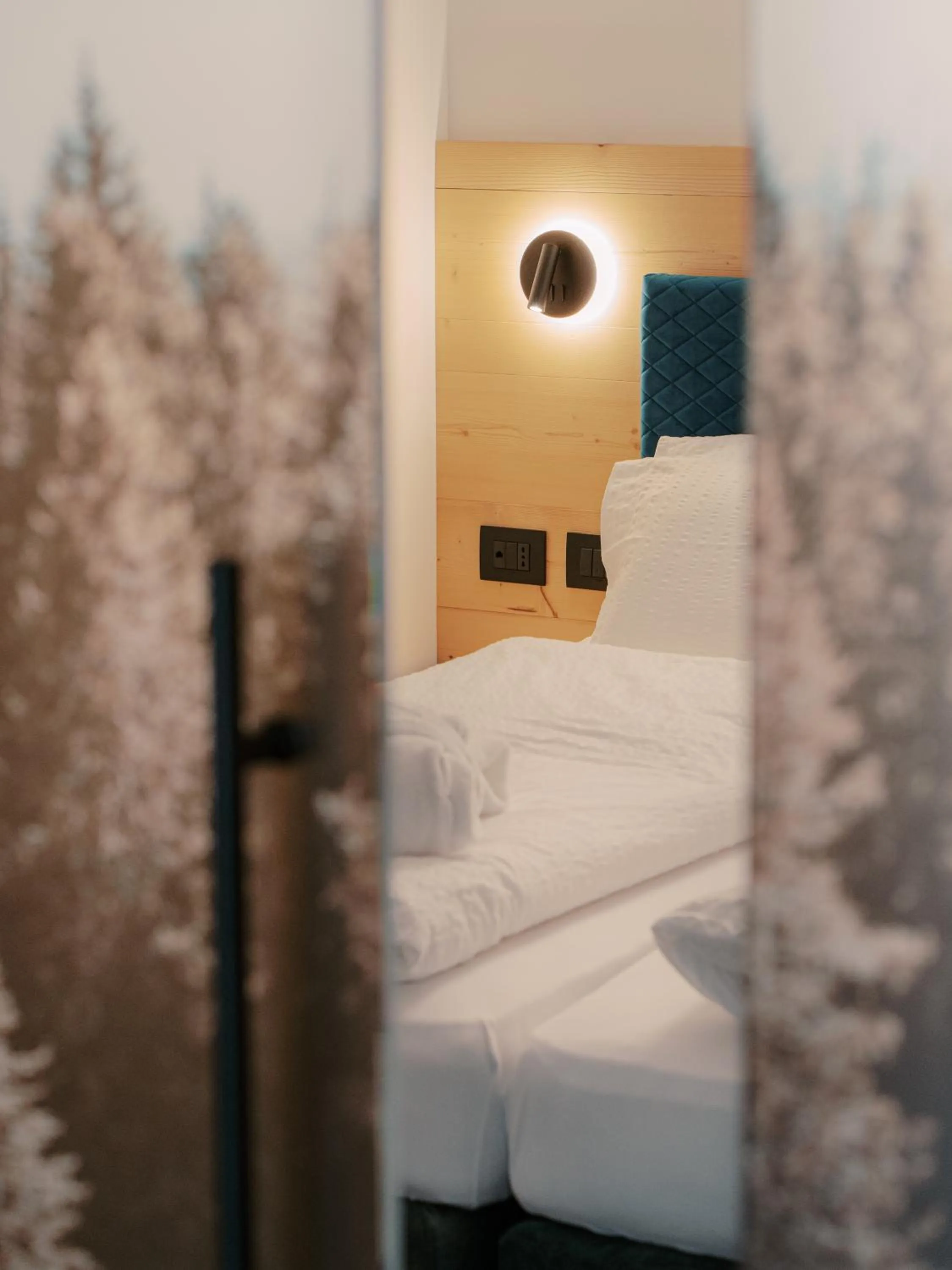 Bed in Alpen Hotel Vidi