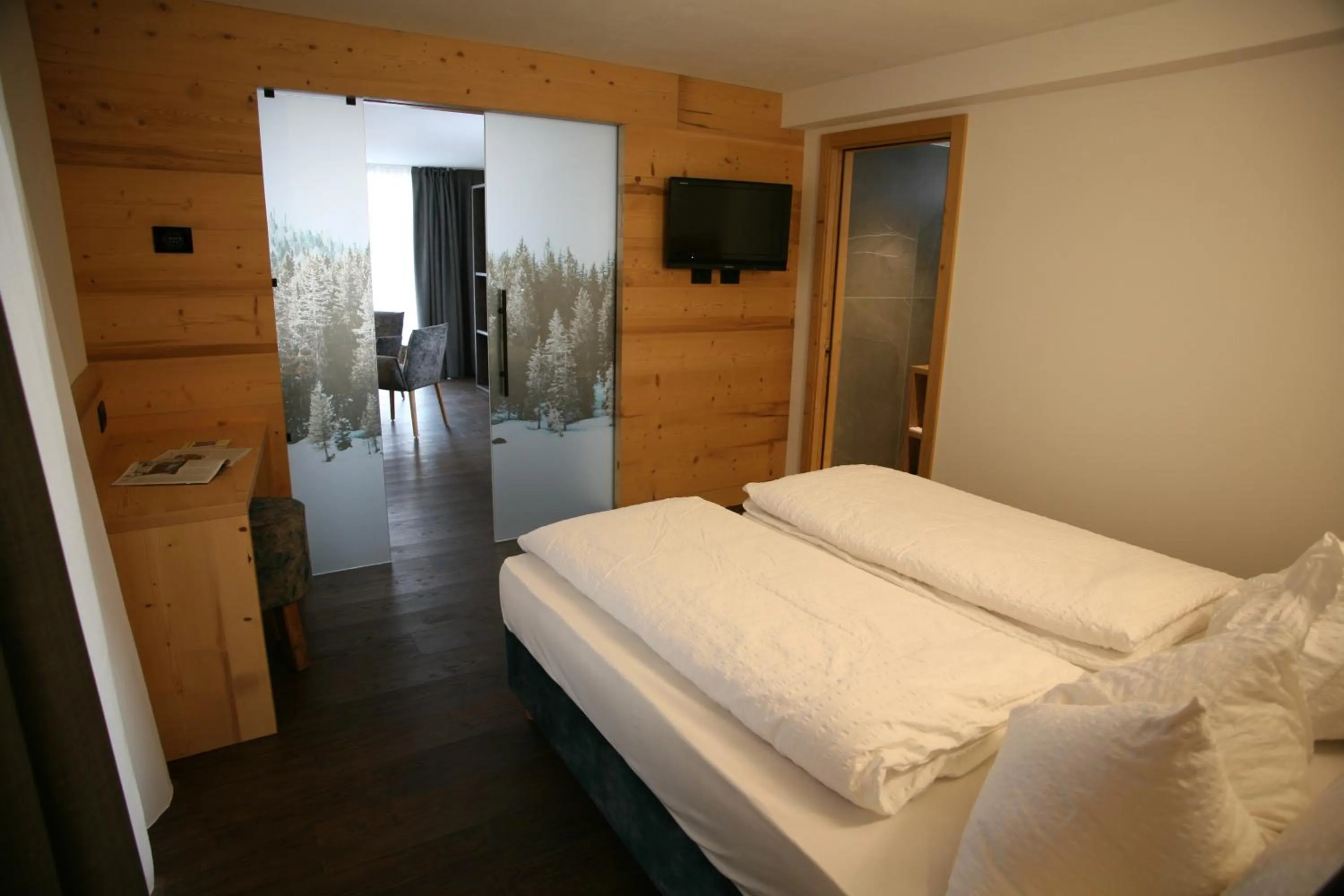 Bed in Alpen Hotel Vidi